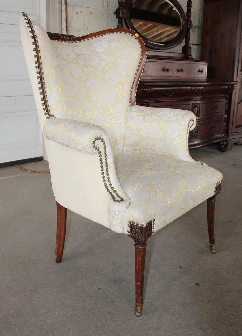 Unknown Vintage Mahogany Wingback Chair With Carved Detailing For Sale