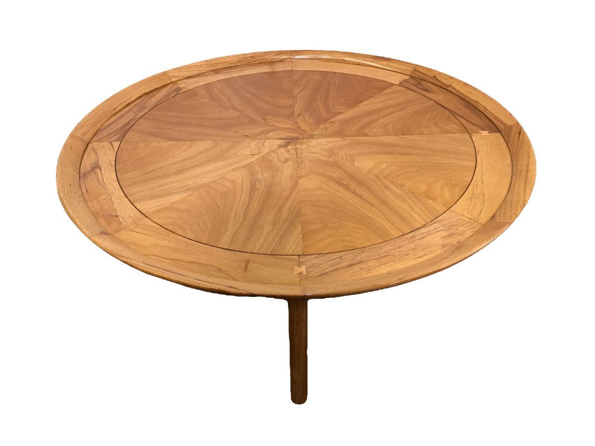 Vintage mahogany wood round coffee table with butterfly joinery. Sophisticate by Tomlinson. $2,400
 
This beautiful mahogany round coffee table features a gorgeous sunburst pattern, in addition to butterfly joinery and a recessed top, making it a
