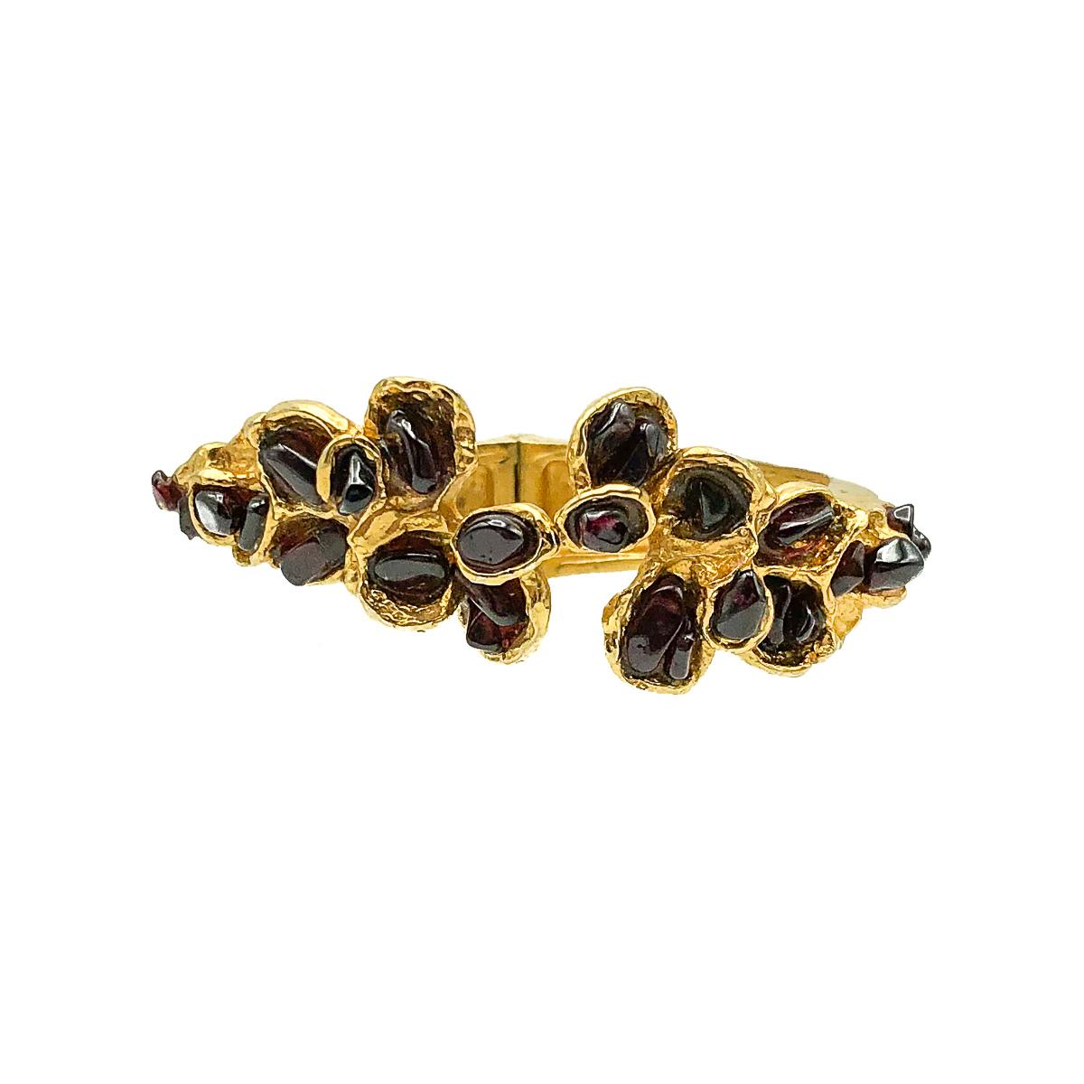 A Vintage Goossens Garnet Clamper. Crafted with 24ct gold plated brass metal and polished tumbled garnets. In very good vintage condition, unsigned and attributed to Maison Goossens based on the workmanship and materials, approx. 5cm inner diameter