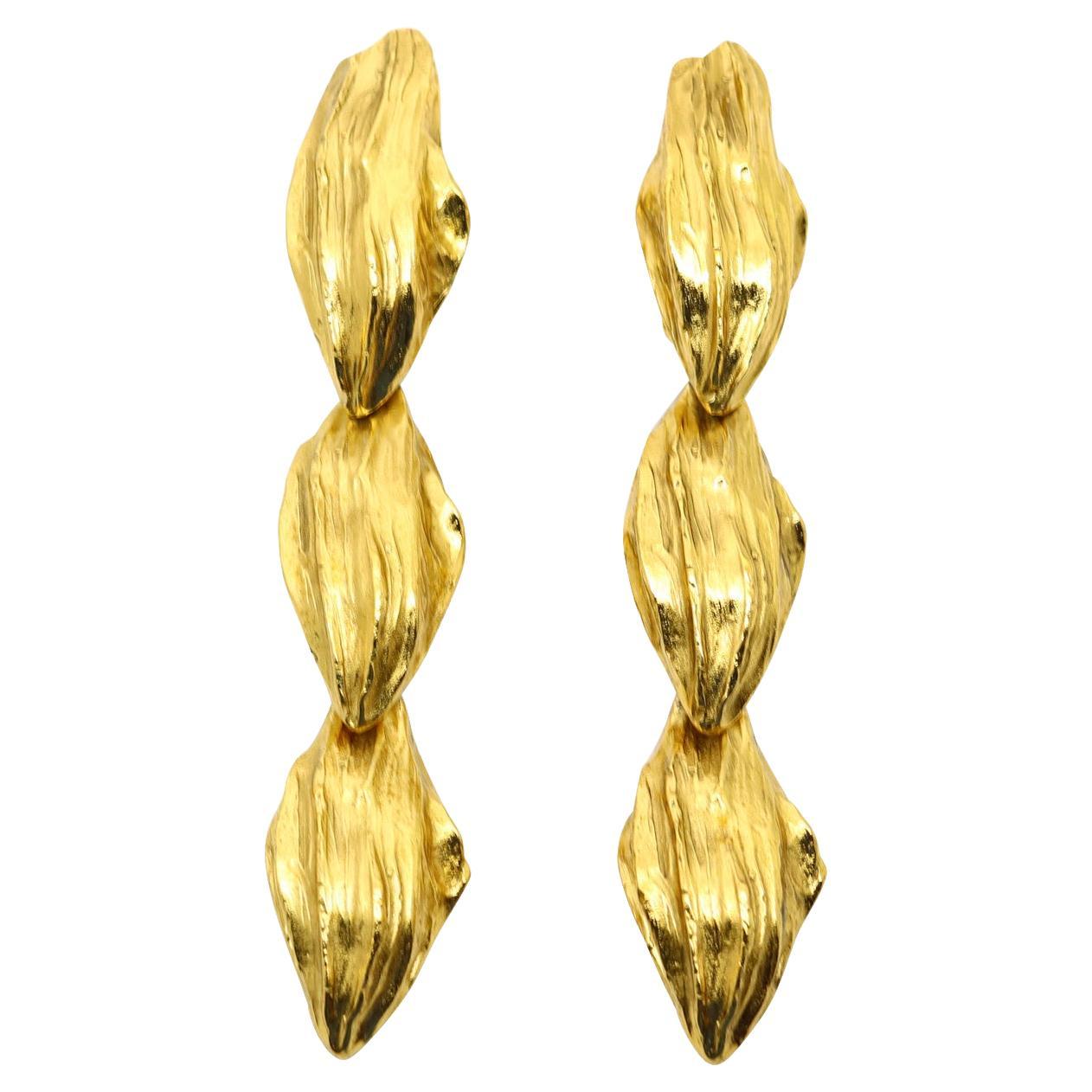 Vintage Maison Goossens Yves Saint Laurent YSL Gold Tone Dangling Textured Earrings. Clip on. One of those that becomes magical when you see it on You. These are the type of earrings or clothing that don't always have hanger or curb appeal until you