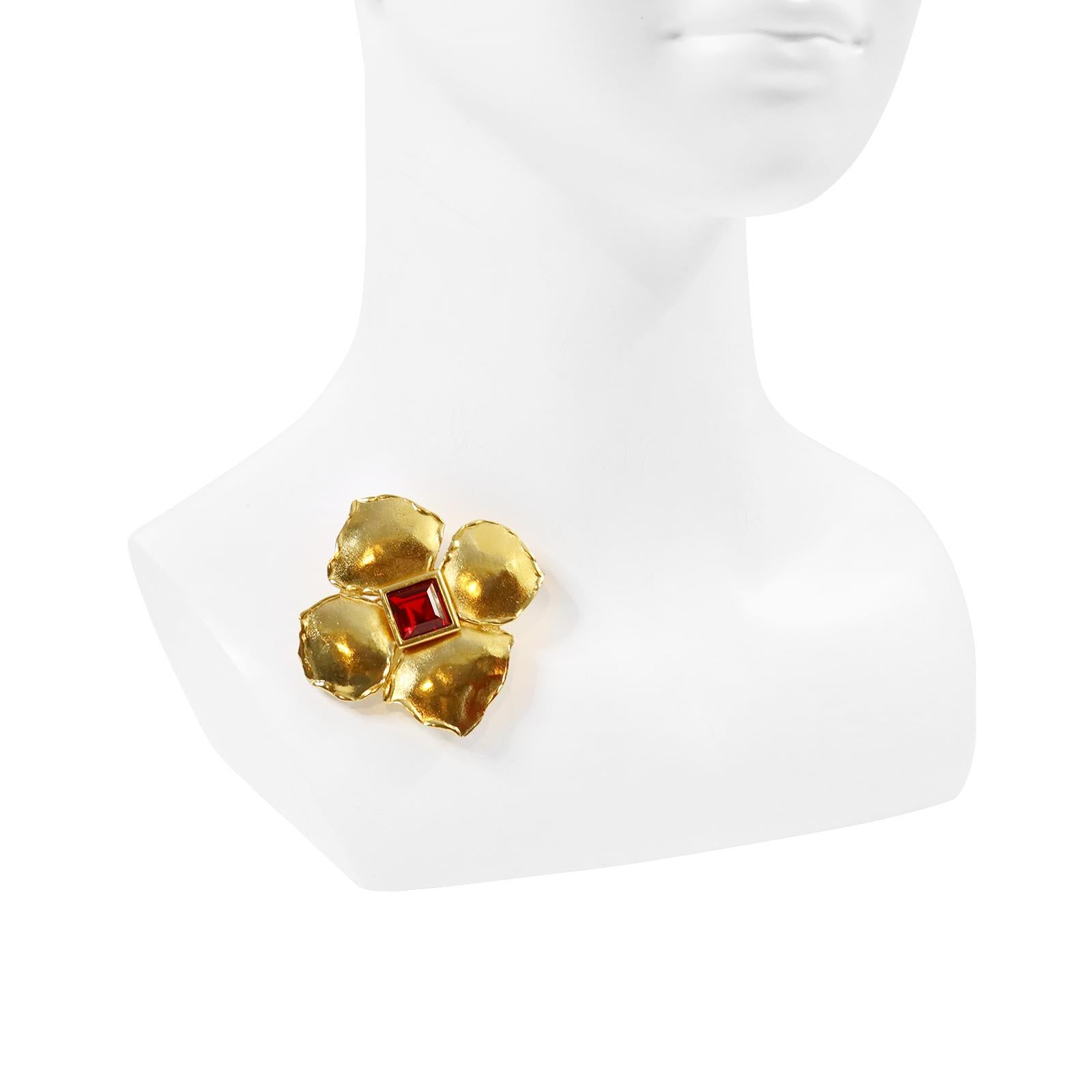Vintage Maison Goossens Yves Saint Laurent YSL Gold Tone Flower Brooch.  Red Crystal in the Middle.  Has a Pendant as well. Would be beautiful on Pearls or Gold necklace of any kind. 2.5
