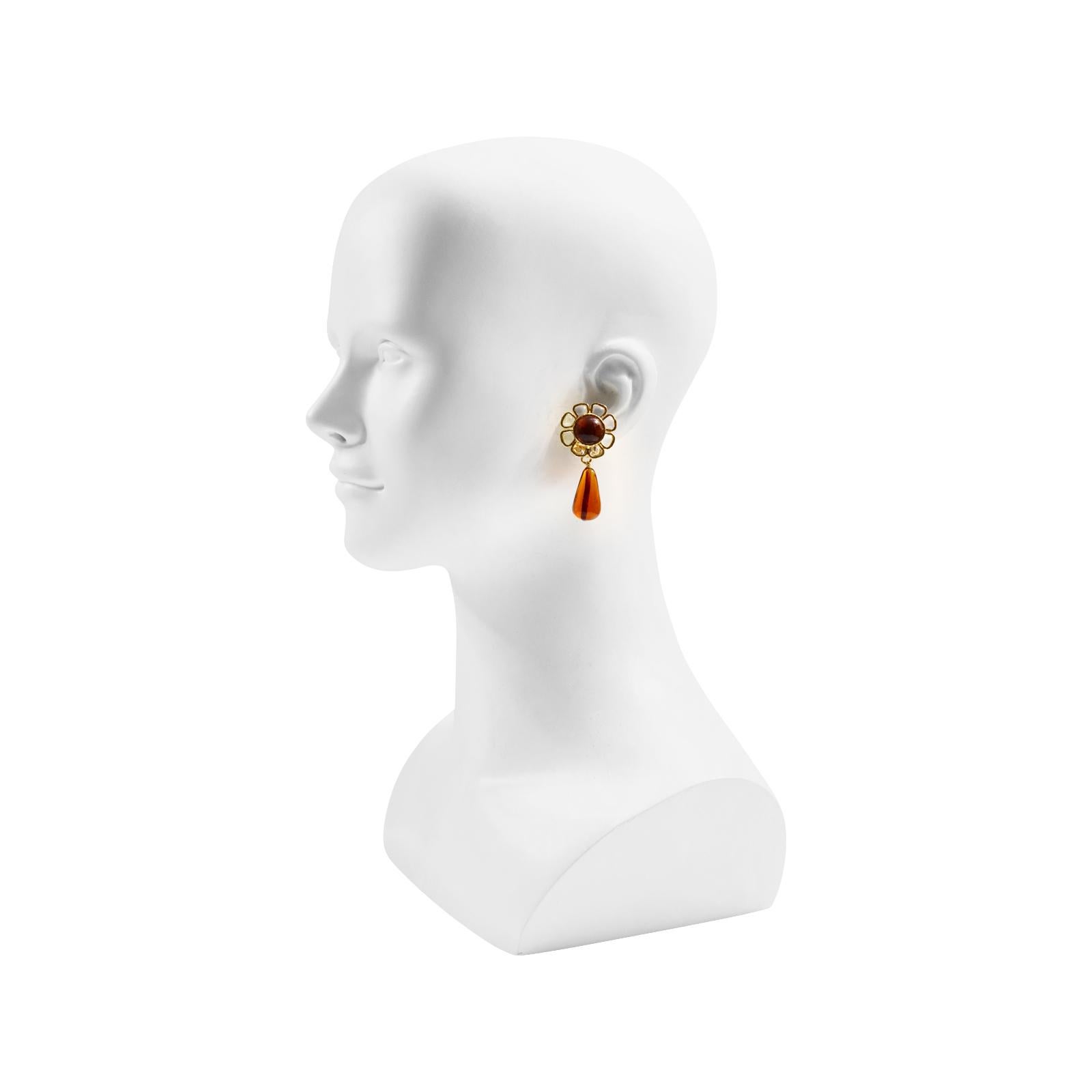 Maison Gripoix Vintage Clear and Muted Red/Orange Flower Dangling Earrings set in gold tone. Always a Classic and will always be relevant in your wardrobe. These are so classic but with an edge!

Guy de Maupassant wrote a famous story about a
