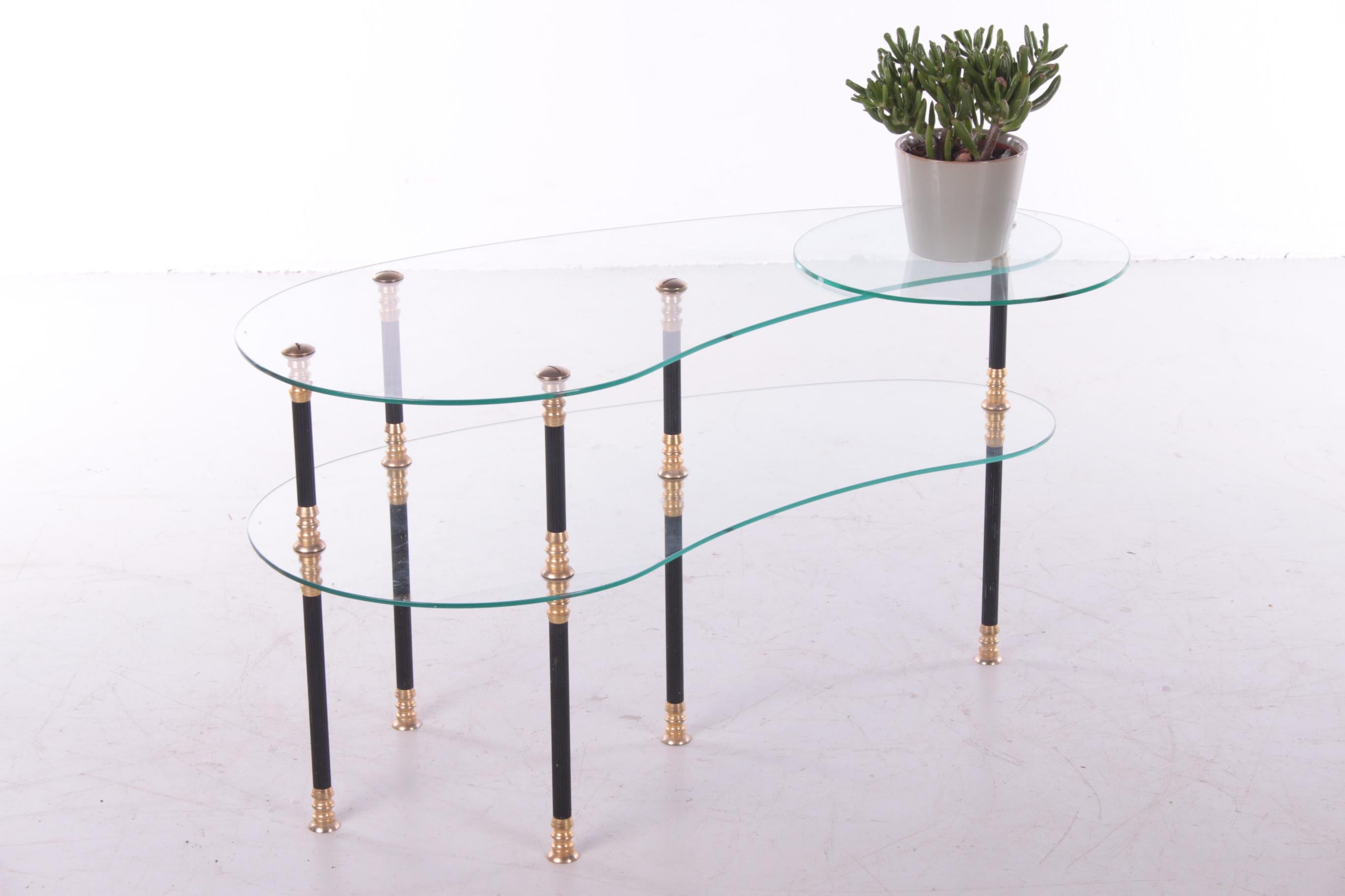 This is a coffee table / side table with 2 layers of glass. The table can be completely disassembled for easy transport and installation.

This table also has an extra glass plate that you can adjust so that it sits exactly to taste. This way you