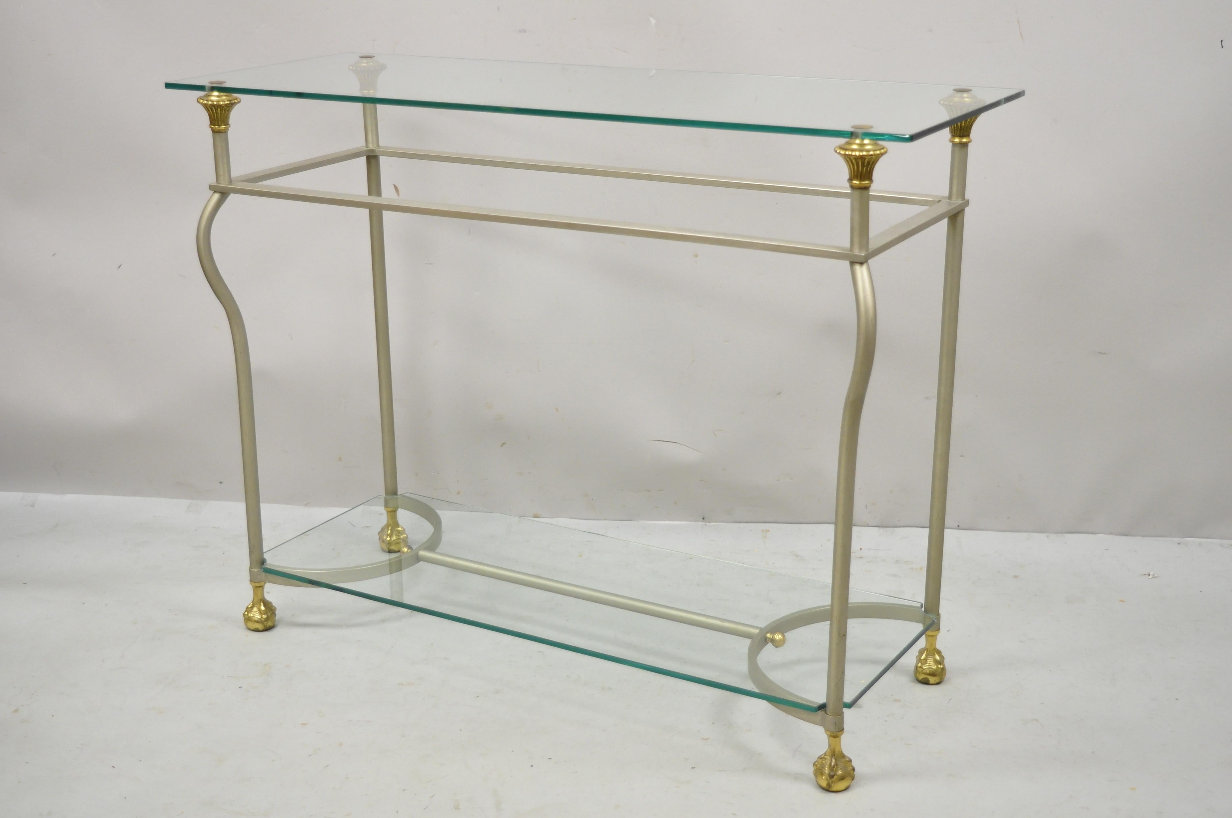Vintage Maison Jansen attributed italian steel and brass ball and claw console sofa hall table. Item features 2 glass shelves, steel and brass frame, ball and claw brass feet, stamped 