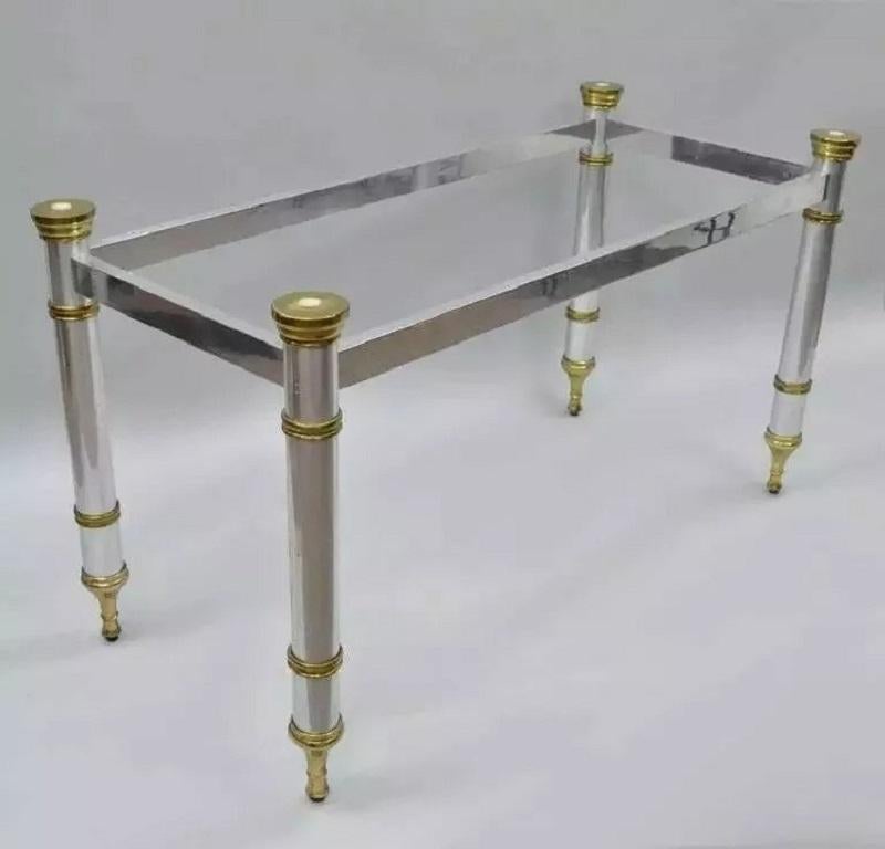 Vintage Maison Jansen Stil Hollywood Regency Chrom & Messing Konsolentisch Basis. Der Stuhl hat einen Stahlrahmen, Messingakzente, spitz zulaufende Füße, klare modernistische Linien, einen großartigen Stil und eine tolle Form. Eine Platte kann