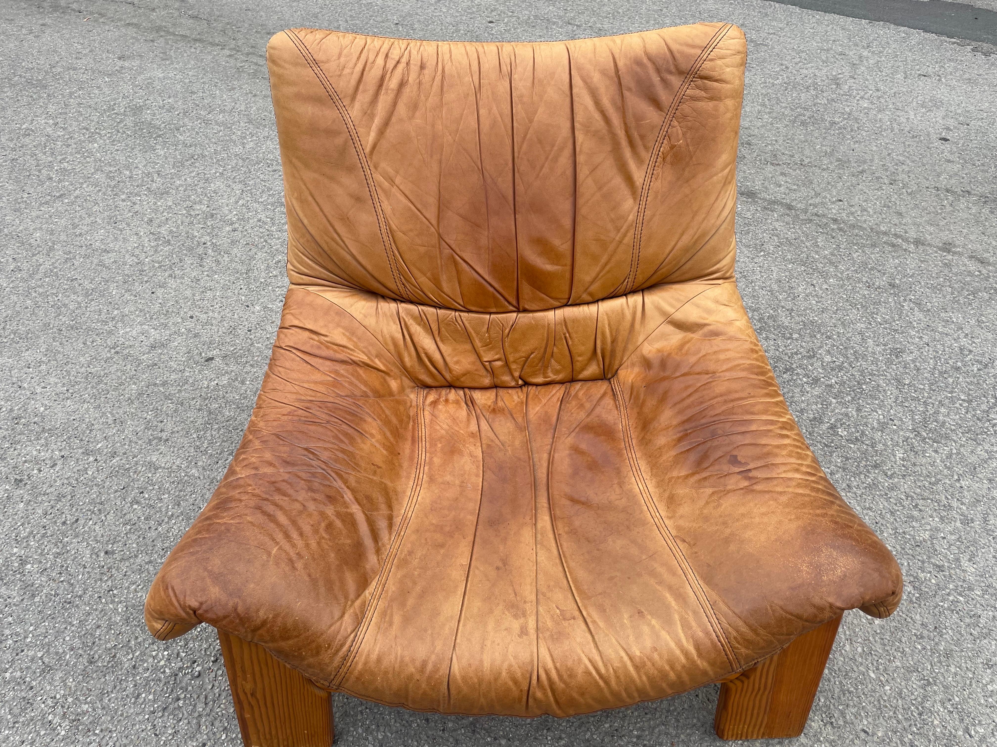 Mid-Century Modern Vintage Maison Regain leather lounge chair in solid pine from the 1960´s For Sale
