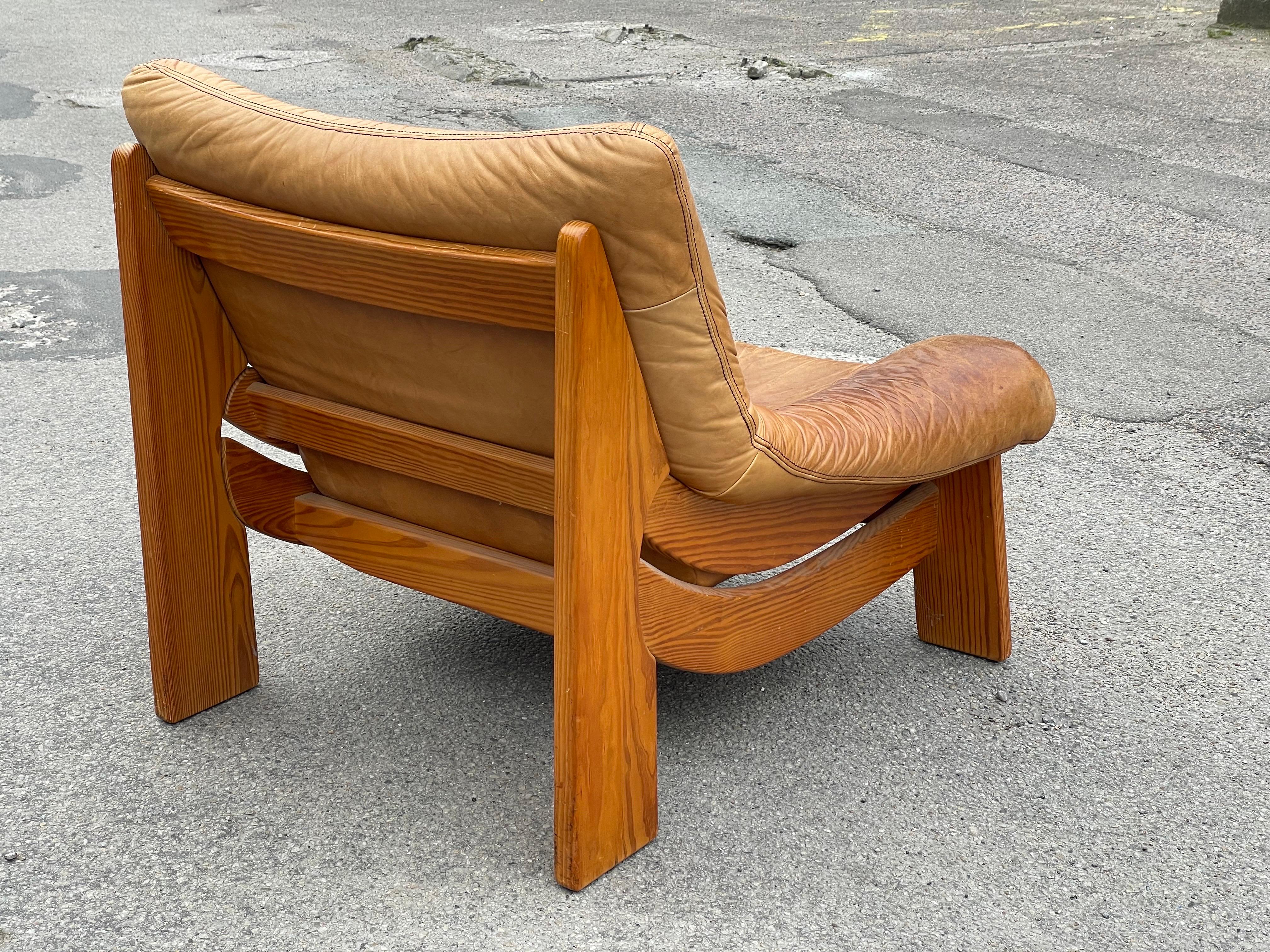 French Vintage Maison Regain leather lounge chair in solid pine from the 1960´s For Sale