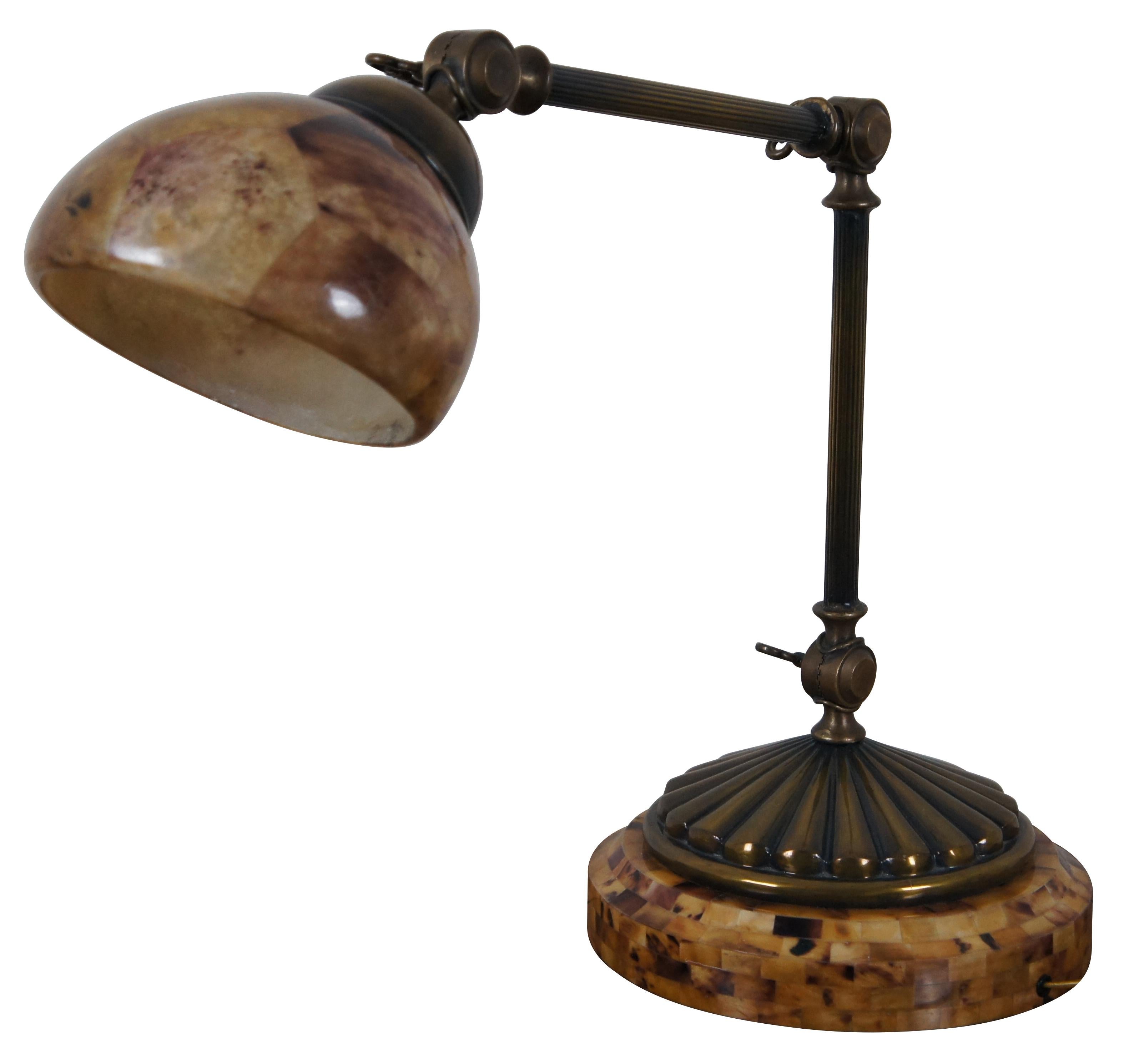 Vintage Maitland Smith table / desk lamp featuring a round tessellated base supporting a brass fluted column body with multiple points of articulation, finished with a penshell shade.