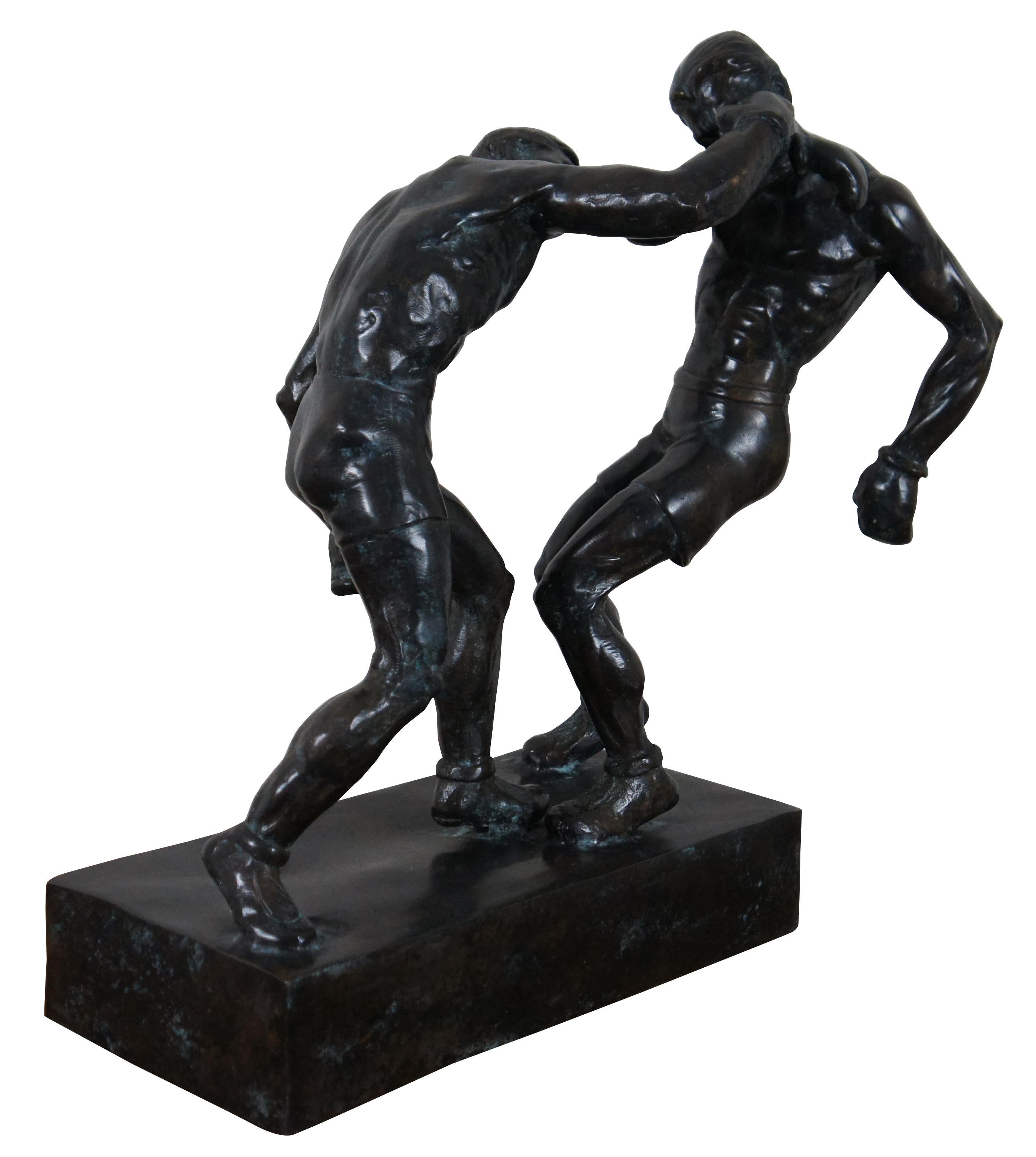 Bronze sculpture statue portraying two boxers in the midst of a heavyweight bout. Attributed to Maitland Smith, after an original work by Mahonri Mackintosh Young.
 