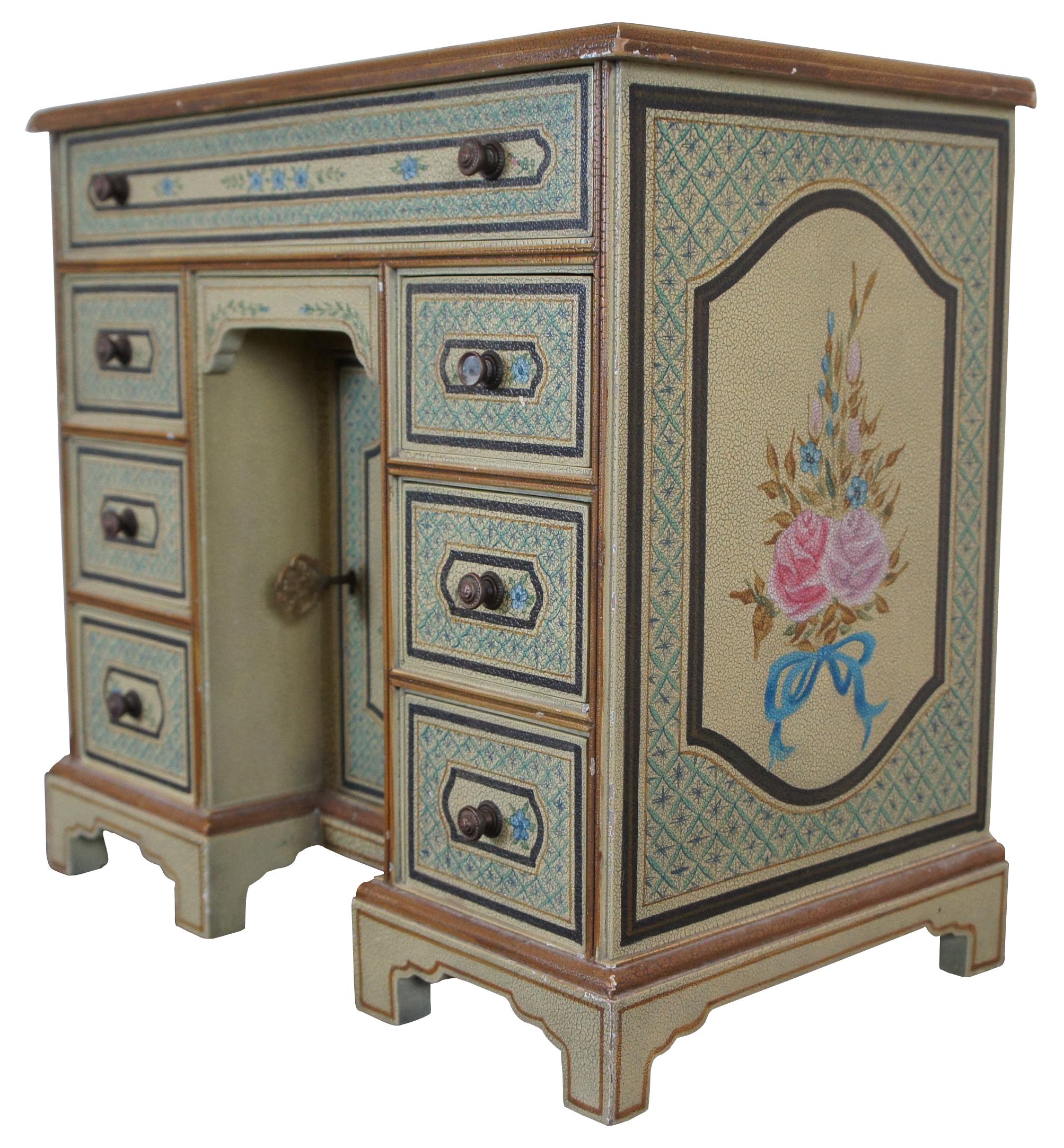 Vintage Maitland Smith dresser top valet or jewelry box in the shape of a Georgian knee hole writing desk, intricately hand painted with a lattice pattern accented with forget-me-nots and and artistically distressed with a crackle or alligator
