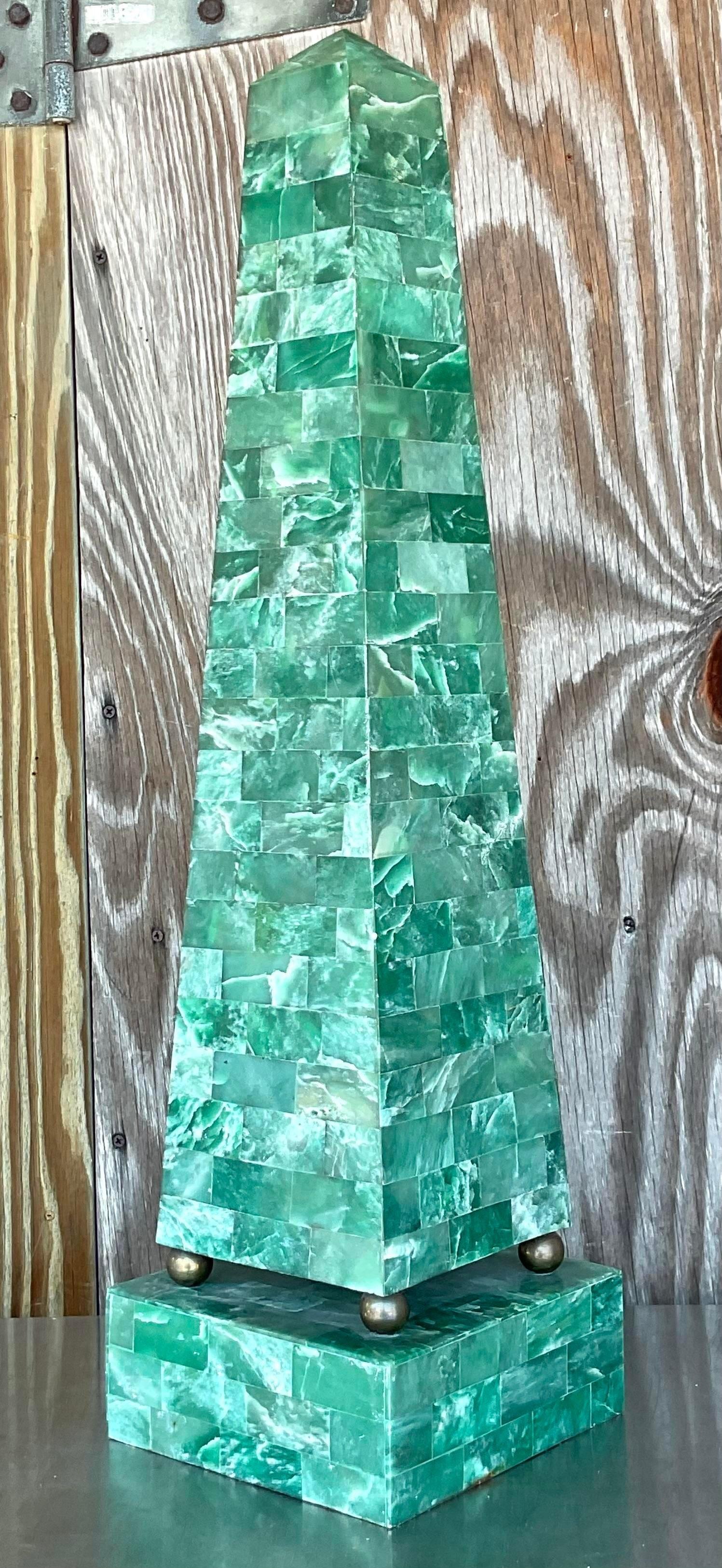 A fantastic vintage Boho monumental obelisk. Chic green tessellated stone in a classic obelisk shape. Made by the iconic Maitland Smith group and tagged on the back. Acquired from a Palm Beach estate.