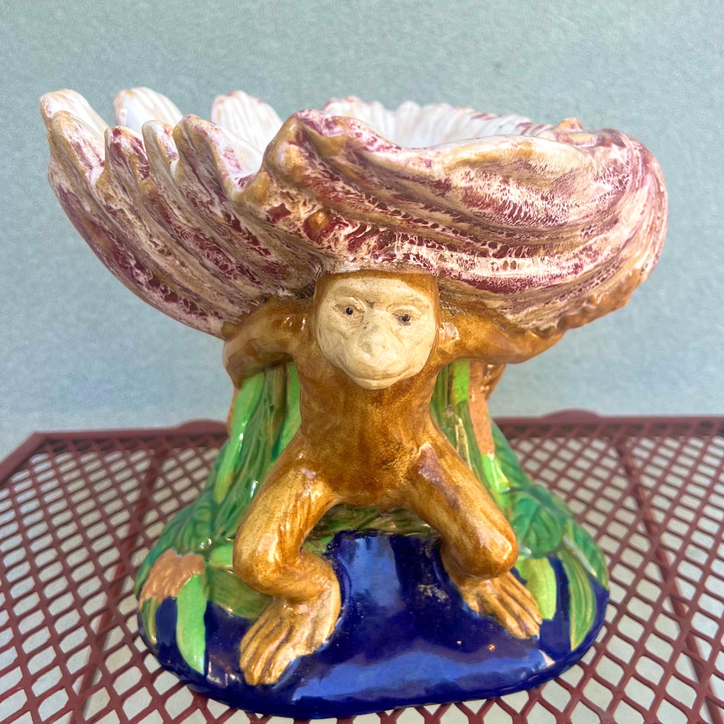 ceramic monkey holding bowl