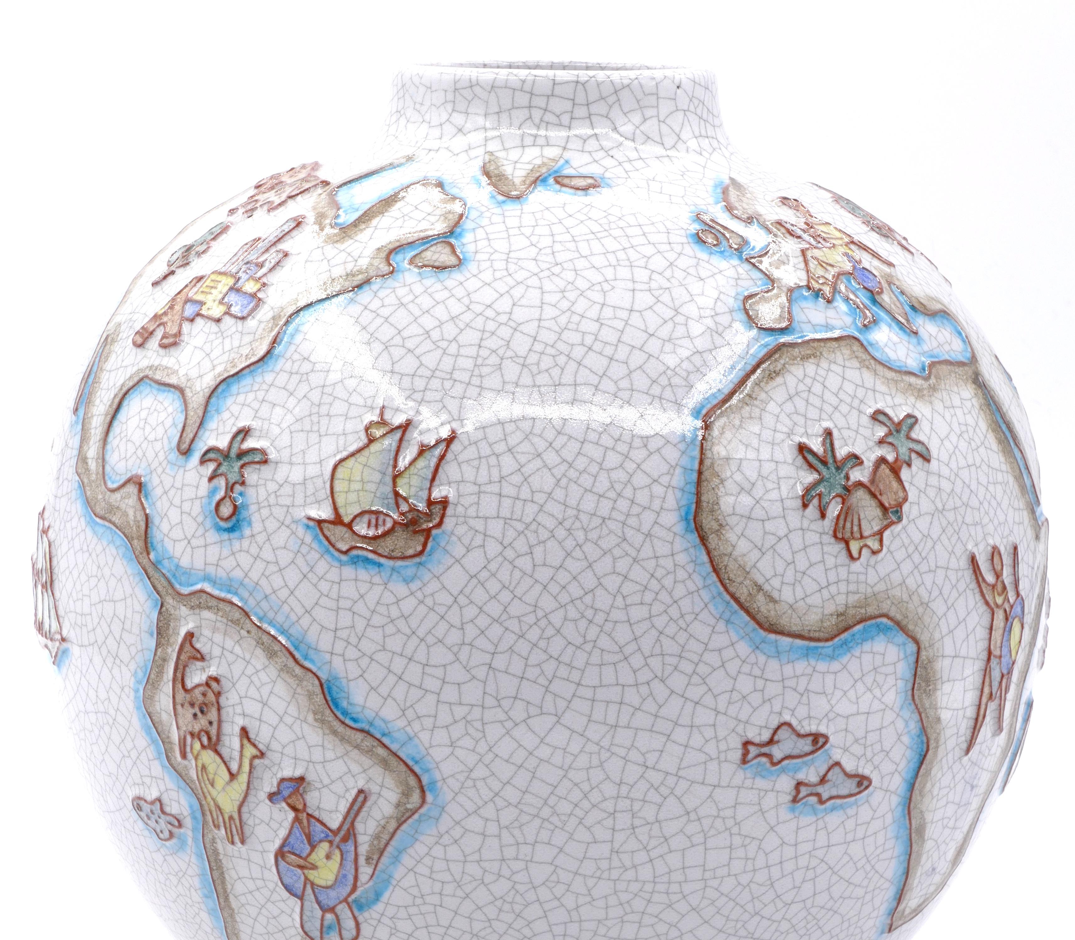 This vase with world map is a wonderful contemporary Majolica vase, realized by the German artist Karl-Heinz Feisst (born in 1925 in Karlsruhe).

The brick-red shards are enameled with gray crackles and decorated with a 
