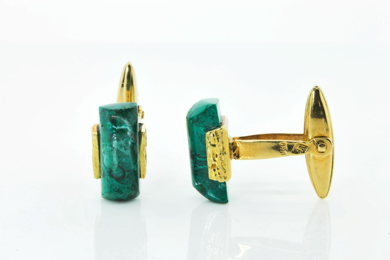 A 1960s pair of sugar loaf Malachite 14KT yellow gold cufflinks.   These stylish cufflinks were manufactured in Israel and stamped 