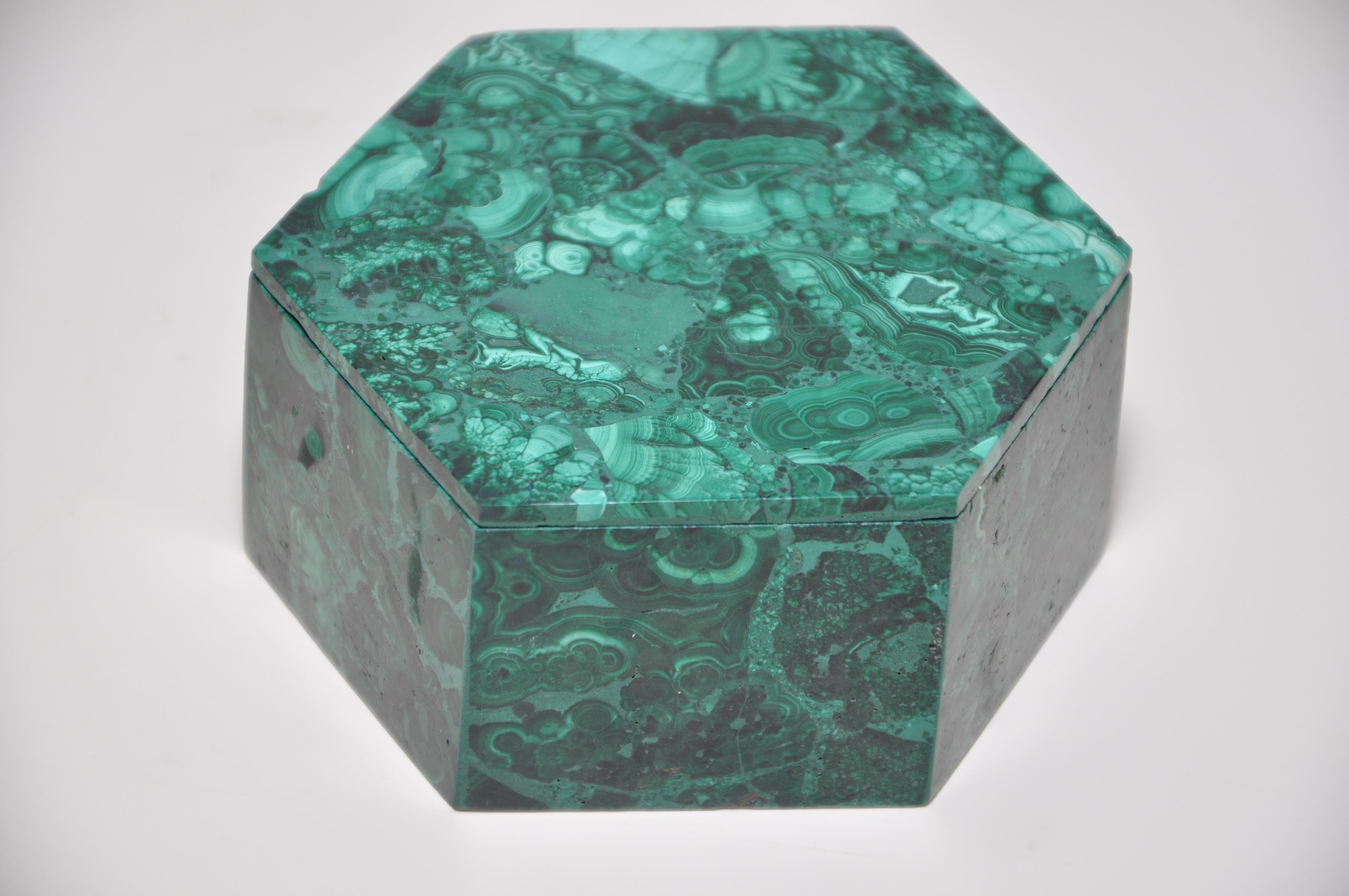 Vintage malachite natural gemstone green jewelry box

Vintage natural malachite gemstone jewelry box, hand carved by an artisan maker, in great condition. Opaque, green, patterned, mineral crystal. A copper based stone, which resonates strongly