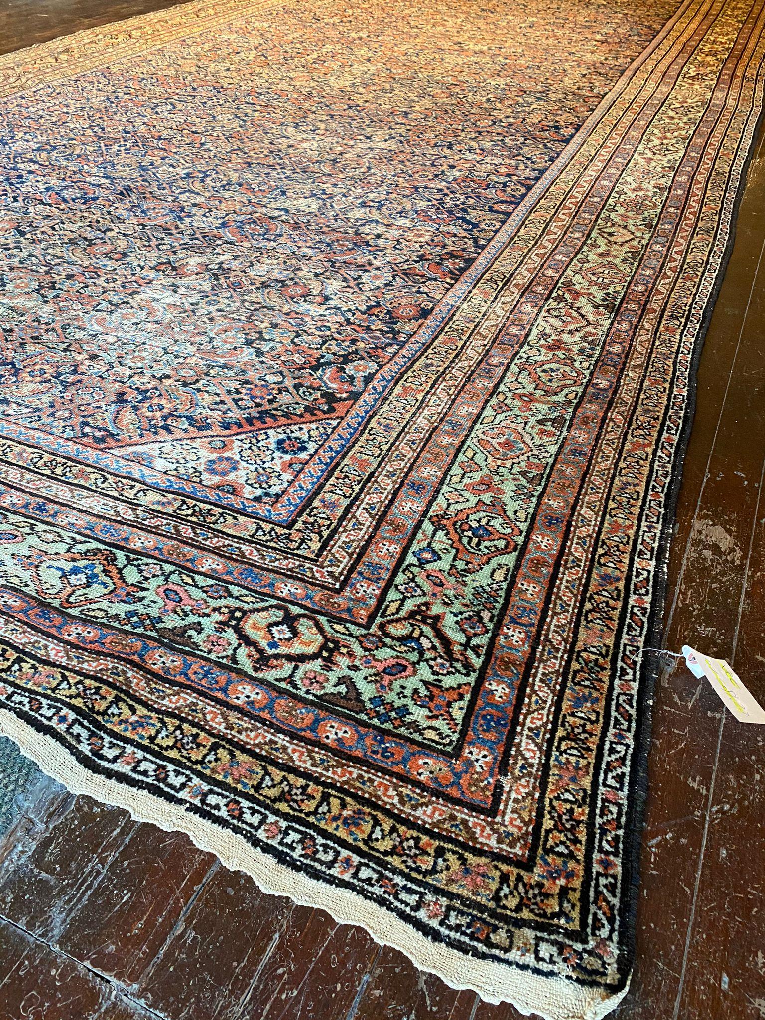 The colors used in this Vintage Malayer Rug are a feast for the eyes. The tans, blues, Sienna, creams, green, browns, gold, and beige hues are carefully selected to create a harmonious and balanced composition. The interplay of these colors adds