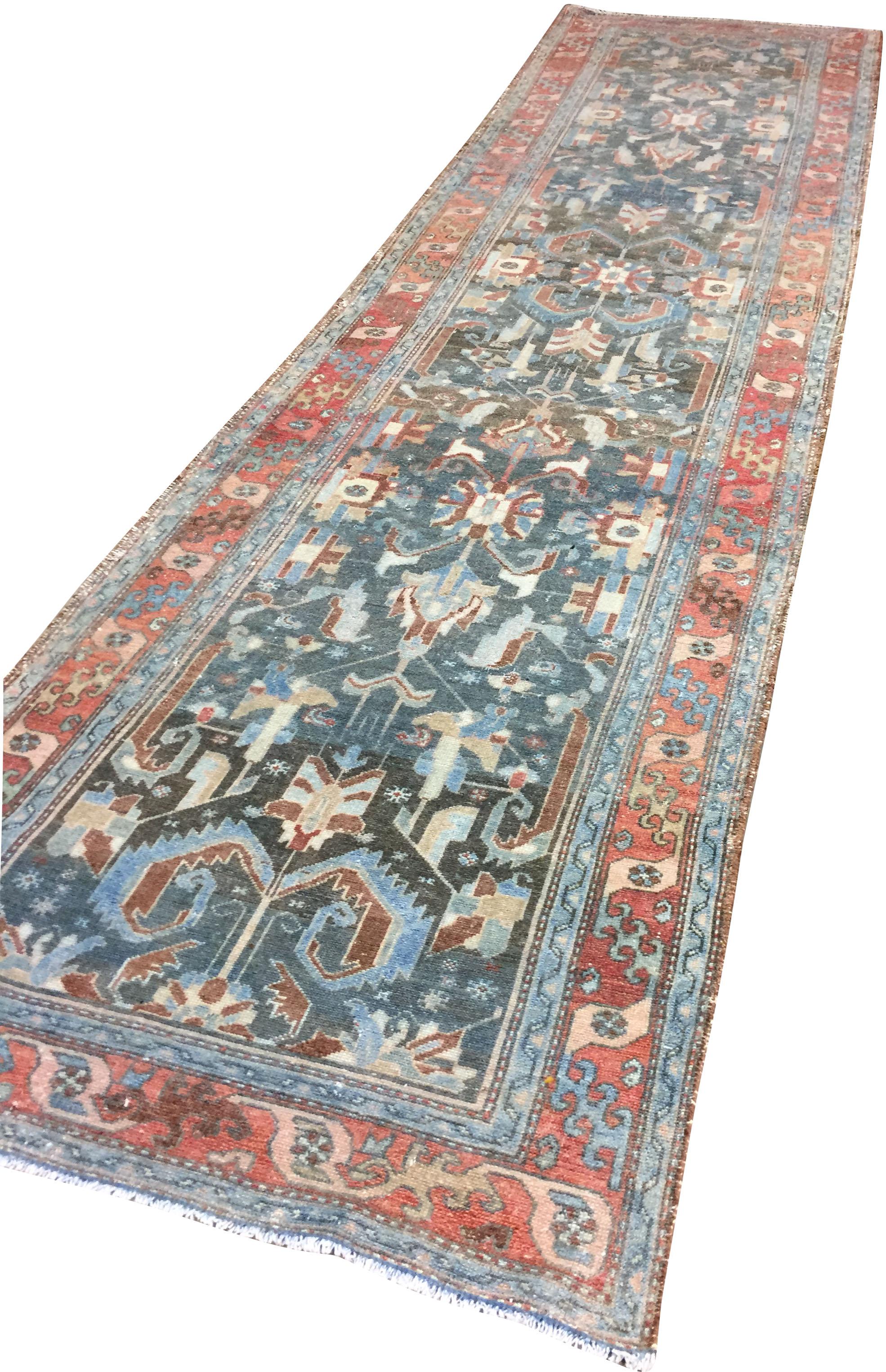 Vintage Malayer runner, circa 1920. A soft and delightful looking vintage 1920s runner handwoven in Malayer Persia. The floral and vine designs in the field and border create a piece that will enhance and add beauty to a room. Size: 3'3 x 12'10.