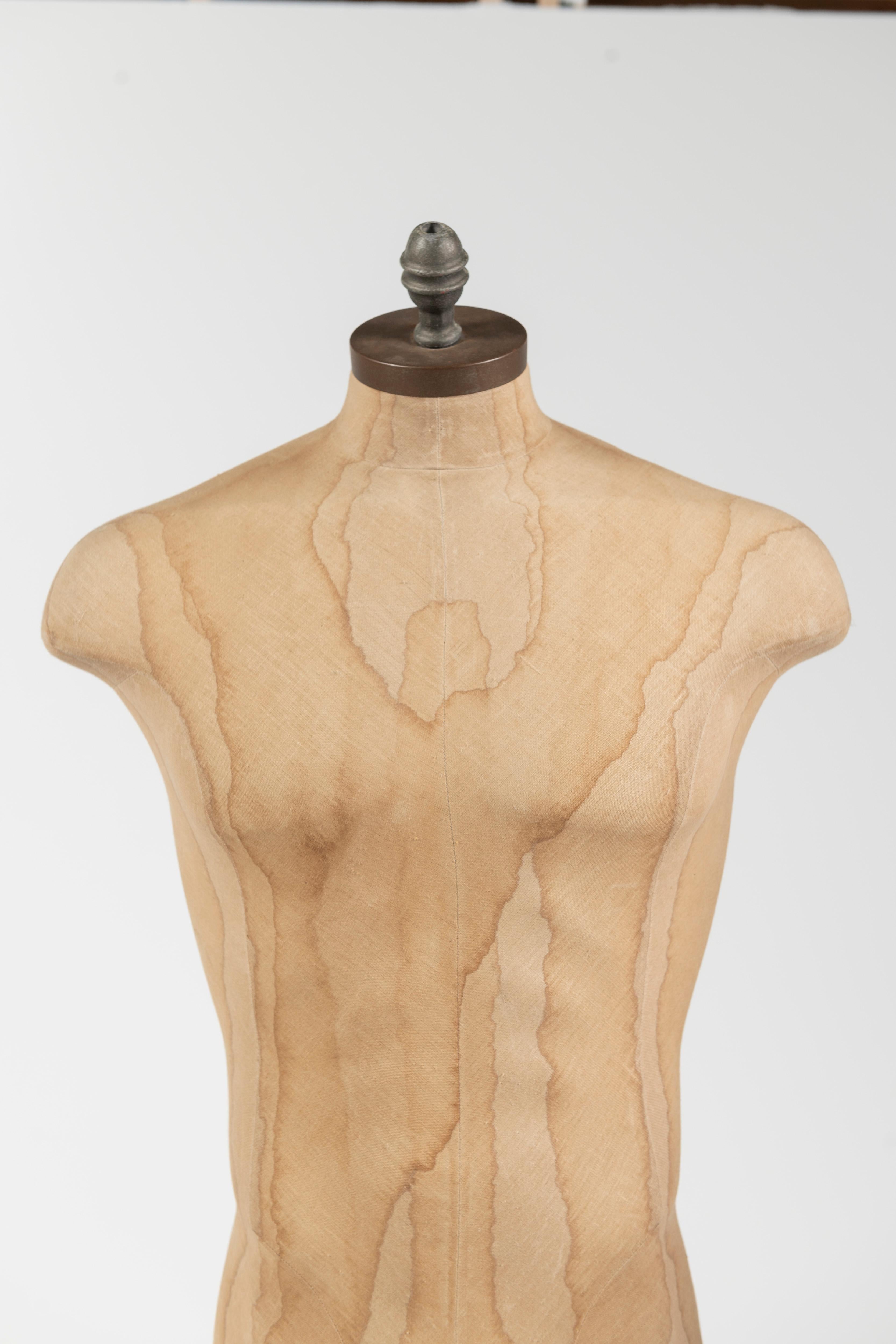 Industry grade mature male torso dress form/mannequin adjusts from 4 to 6 feet in height by applying your foot to the pedal on the stand. The chest measurement is approximately 44