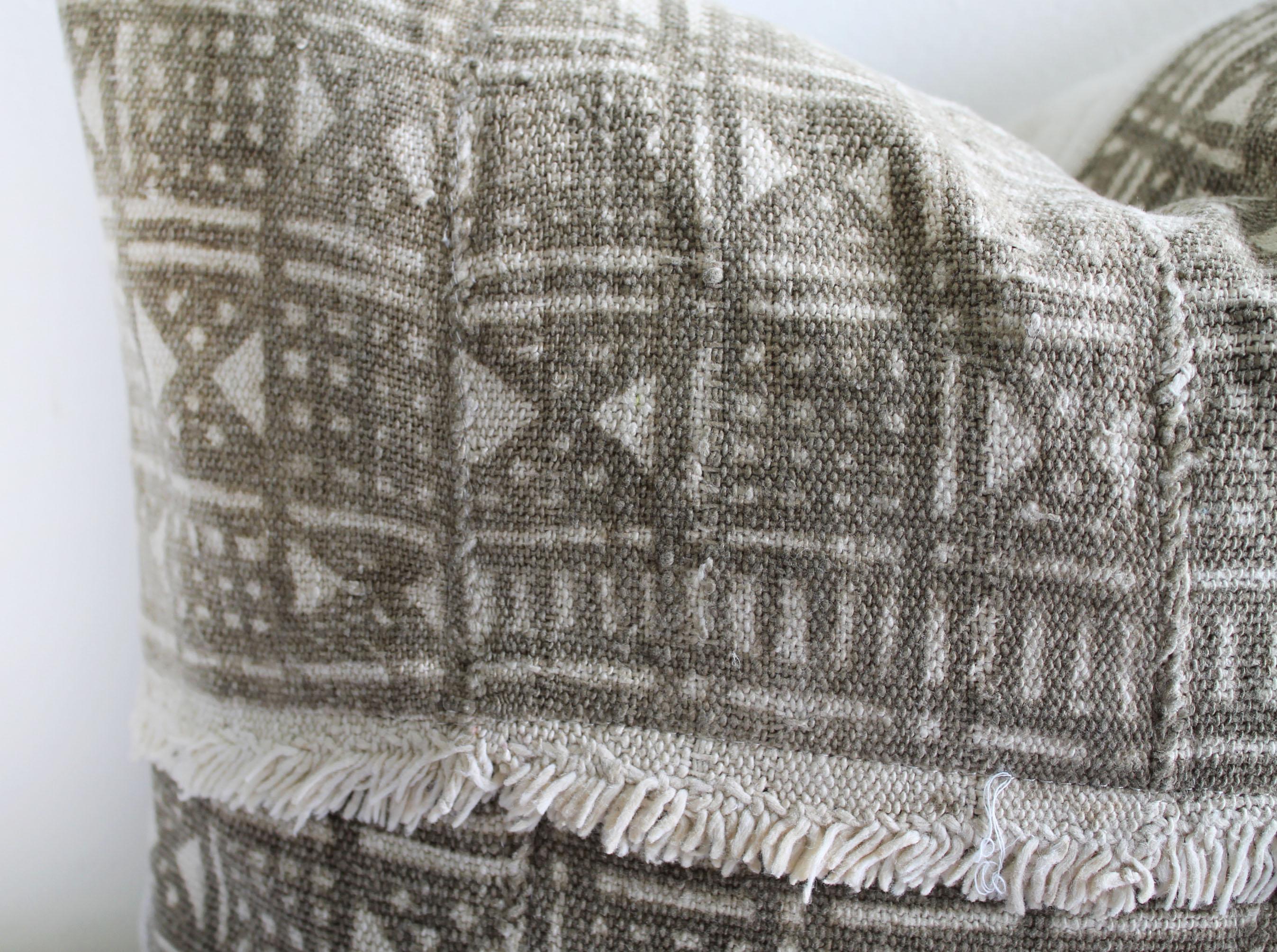 Beautiful vintage South African Mali Cloth face pillow, constructed with the original fringe details. The face is lined with muslin, and back is 100% European Linen. Our pillows are constructed with vintage one of a kind textiles from around the