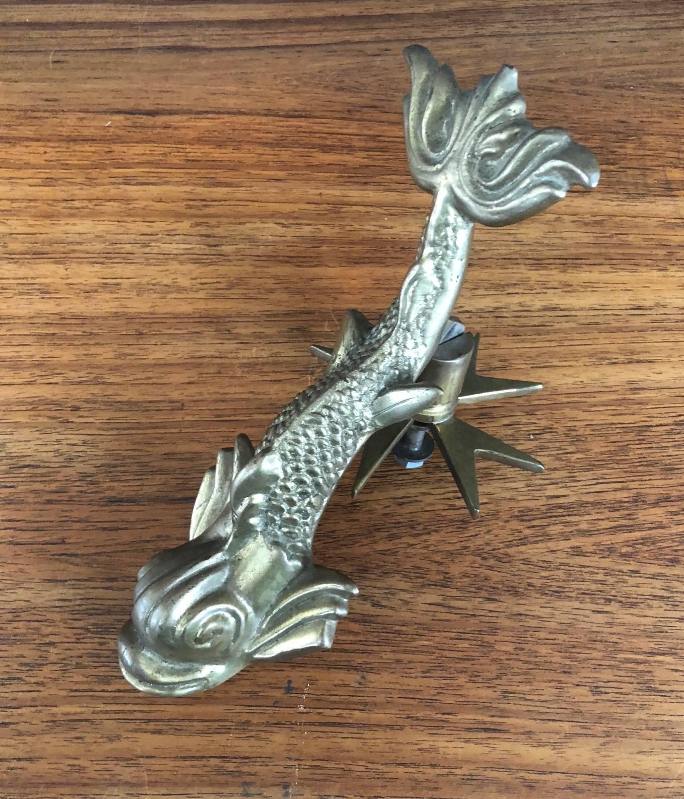Vintage Maltese cross and koi fish figural brass door knocker by Cutajar Works of Malta, circa 1950s. The knocker is quite large measuring: 9.5