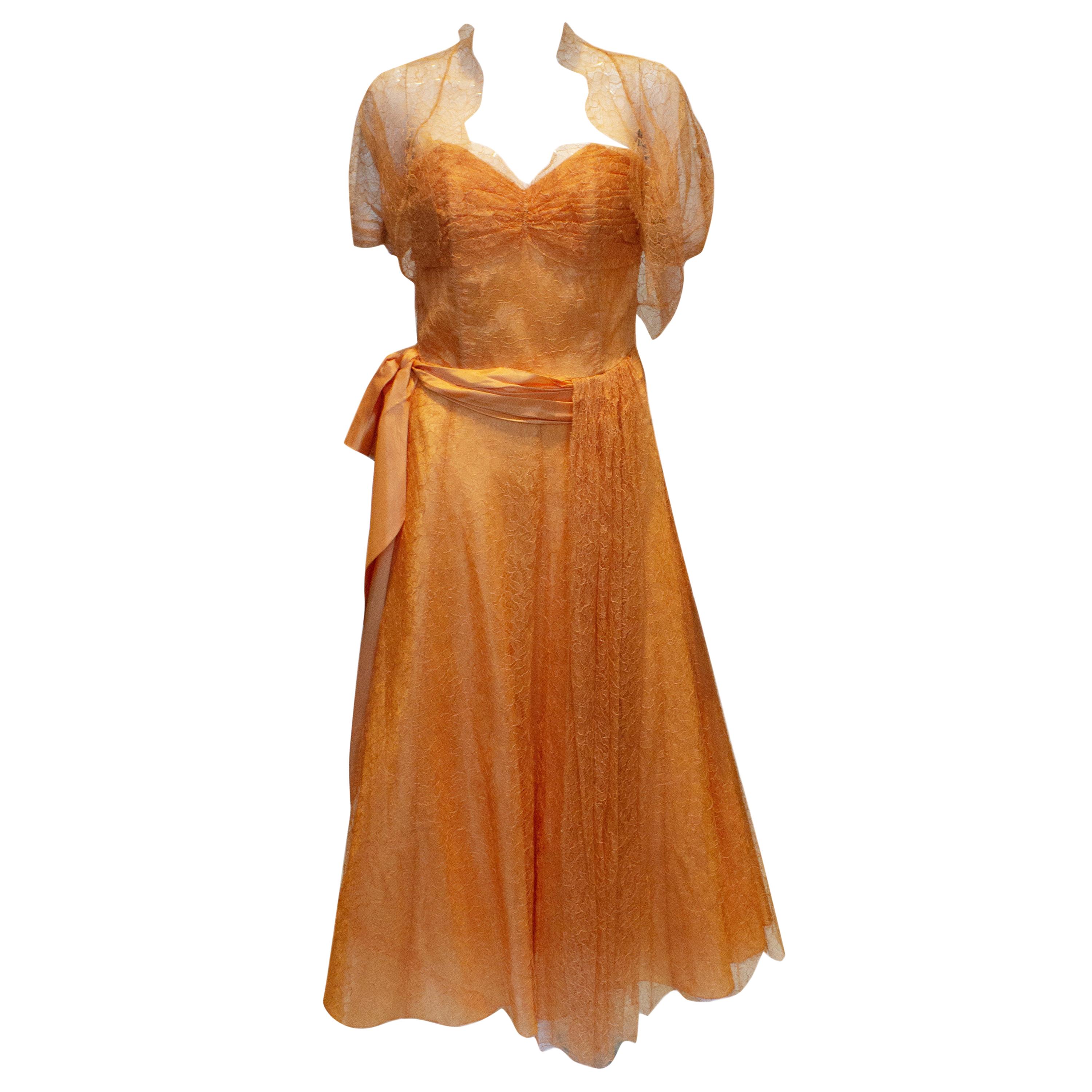 Vintage Mandell Modell London Apricot Lace Dress and Bolero. For Sale