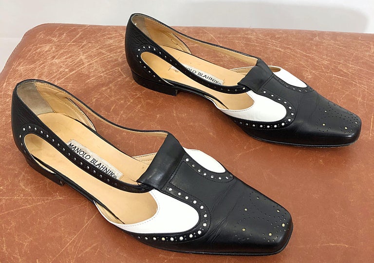 black and white spectator flats