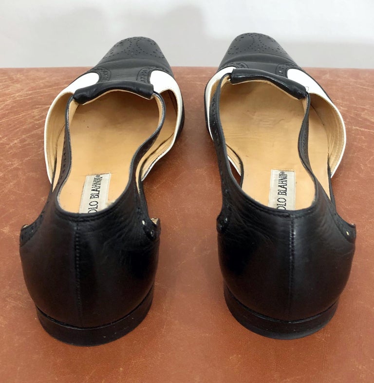 black and white spectator flats