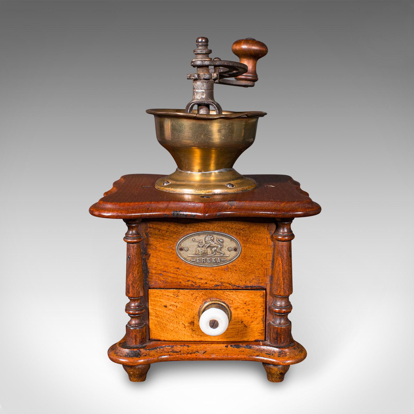 This is a vintage manual coffee grinder. A German, oak and brass rotary bean mill, dating to the Art Deco period, circa 1930.

Appealing, tactile German example in working order
Displays a desirable aged patina and in good, original condition
Oak