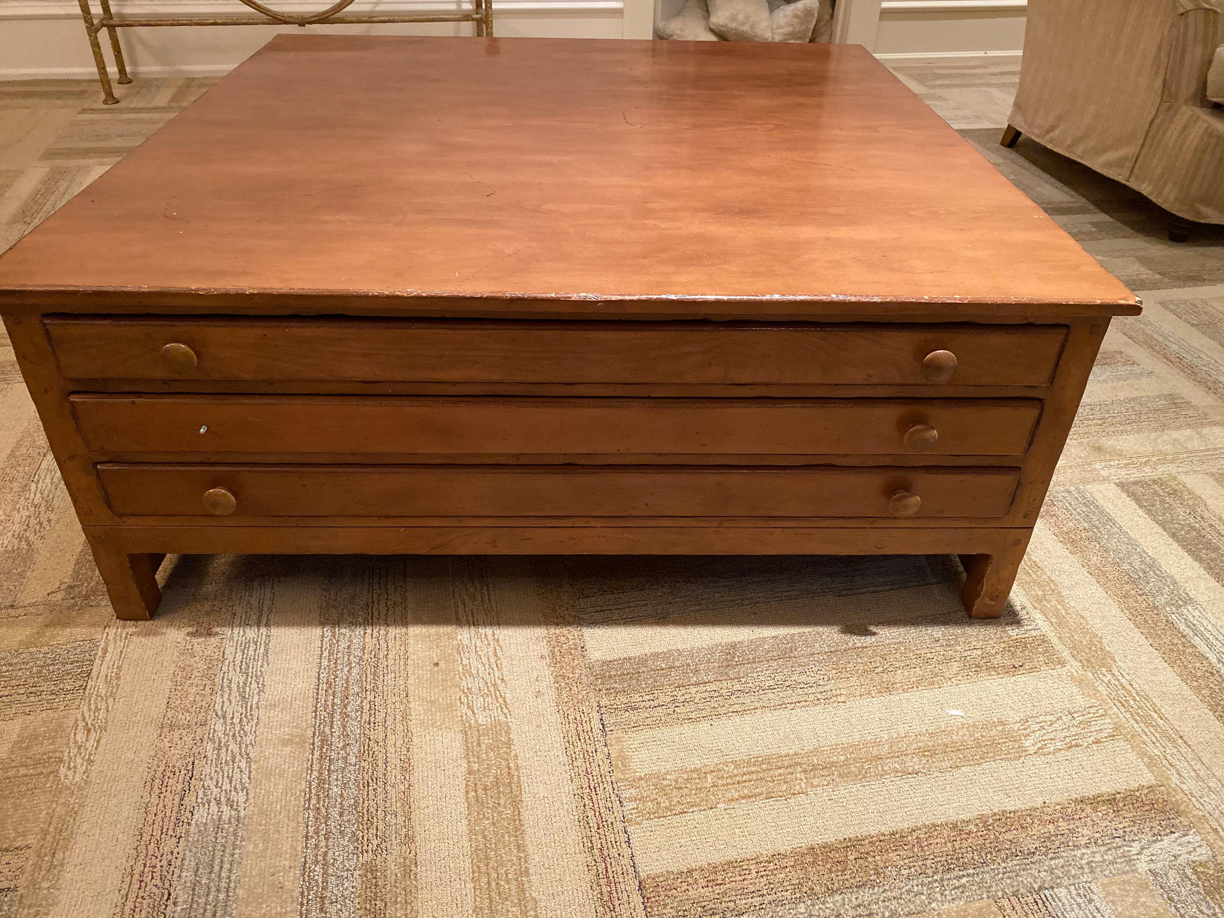 Perfectly scaled for a large space, this coffee table is vintage map drawer style.
Polished maple, large drawers, iconic.
