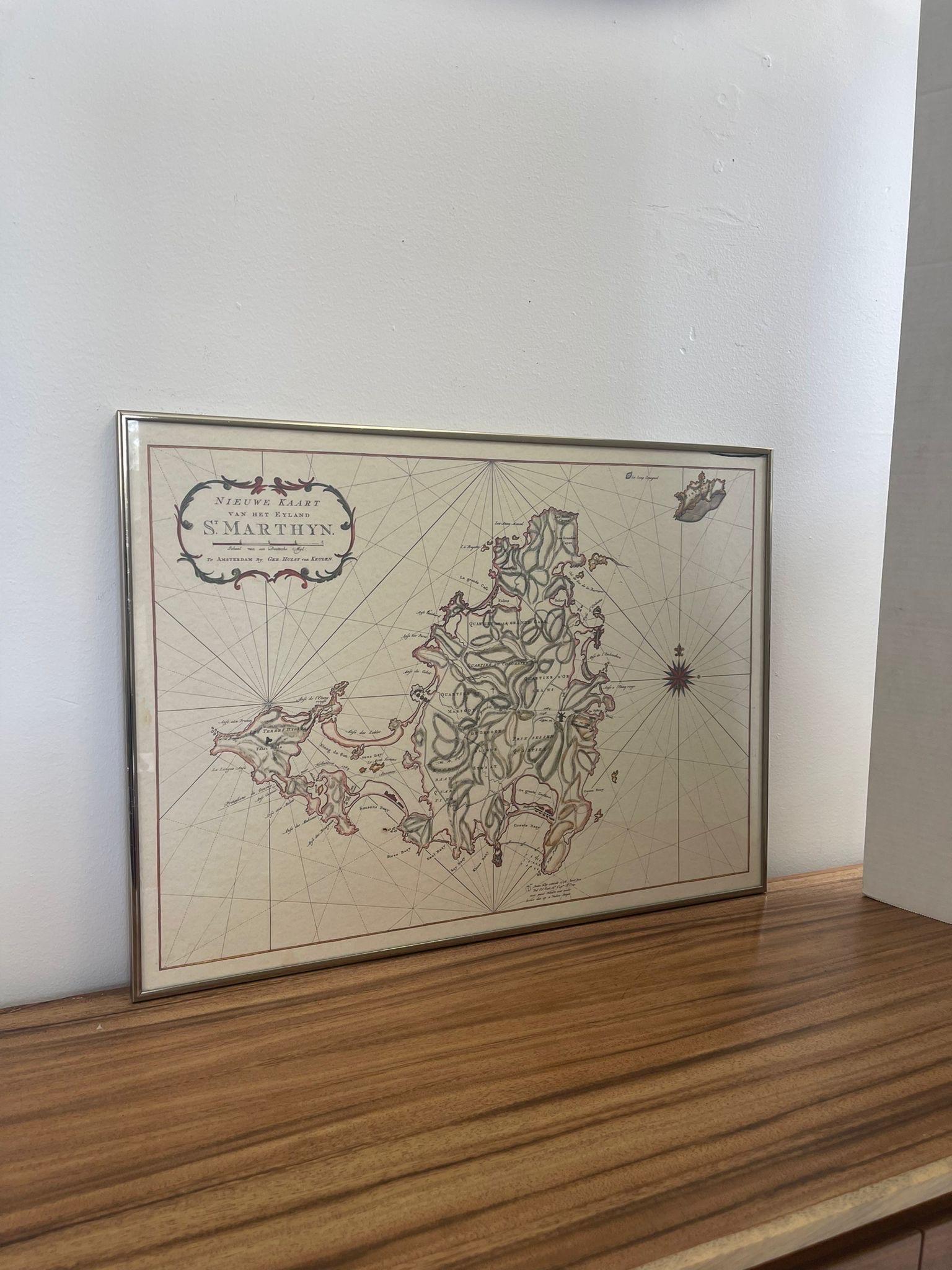 The Saint Martin island was originally St.Marthyn to the Dutch. This is a map of the island and surrounding area. Framed within silver toned professional framing. Vintage Condition Consistent with Age as Pictured.

Dimensions. 24 W ; 1/2 D ; 18 H