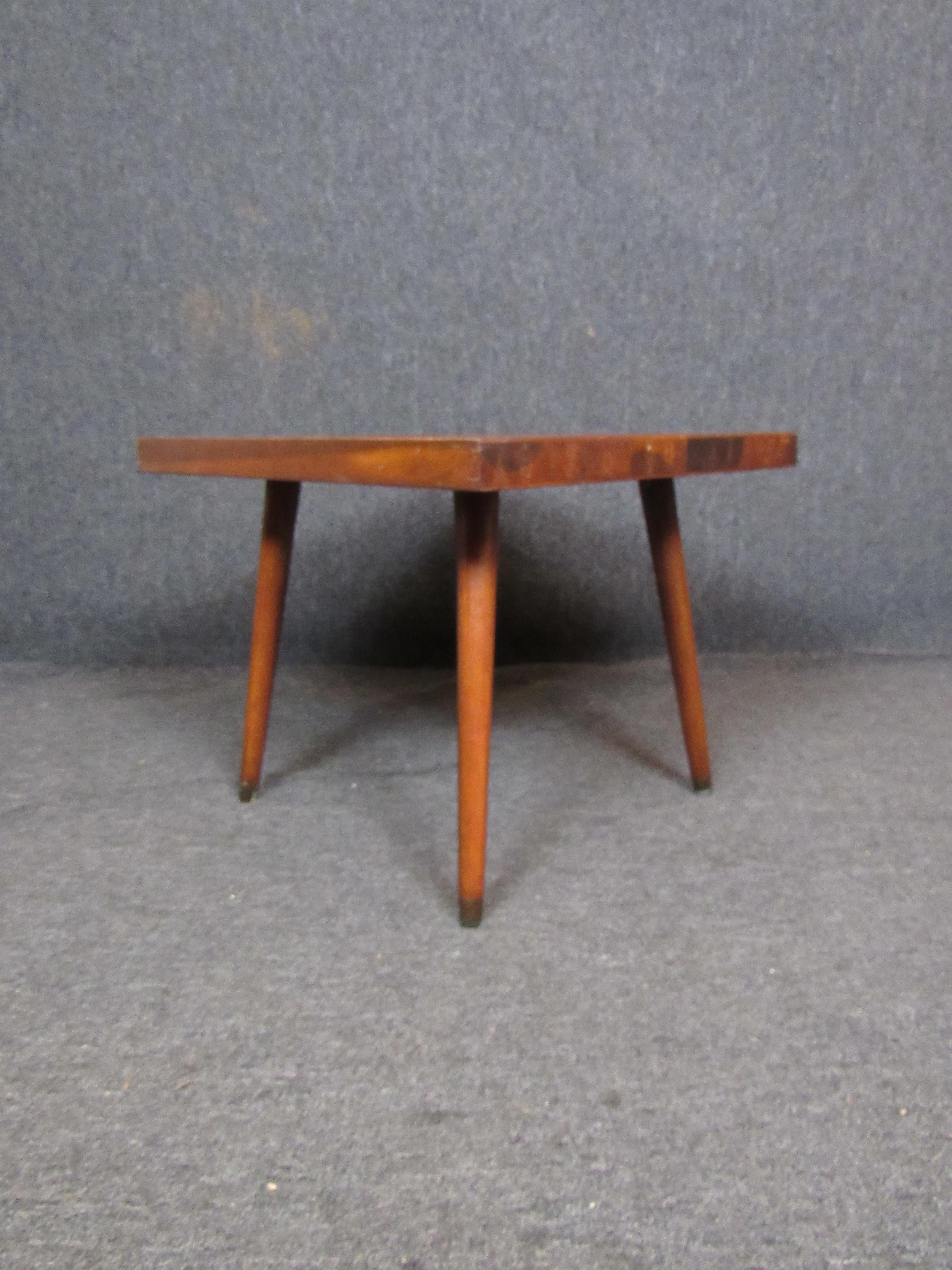 Terrific vintage Mid-Century Morden table in a beautiful golden brown maple. A simple, yet gorgeous design borrows from the styles both of Paul McCobb and George Nakashima for a piece that is both unique, yet classic. A thick slab tabletop paired