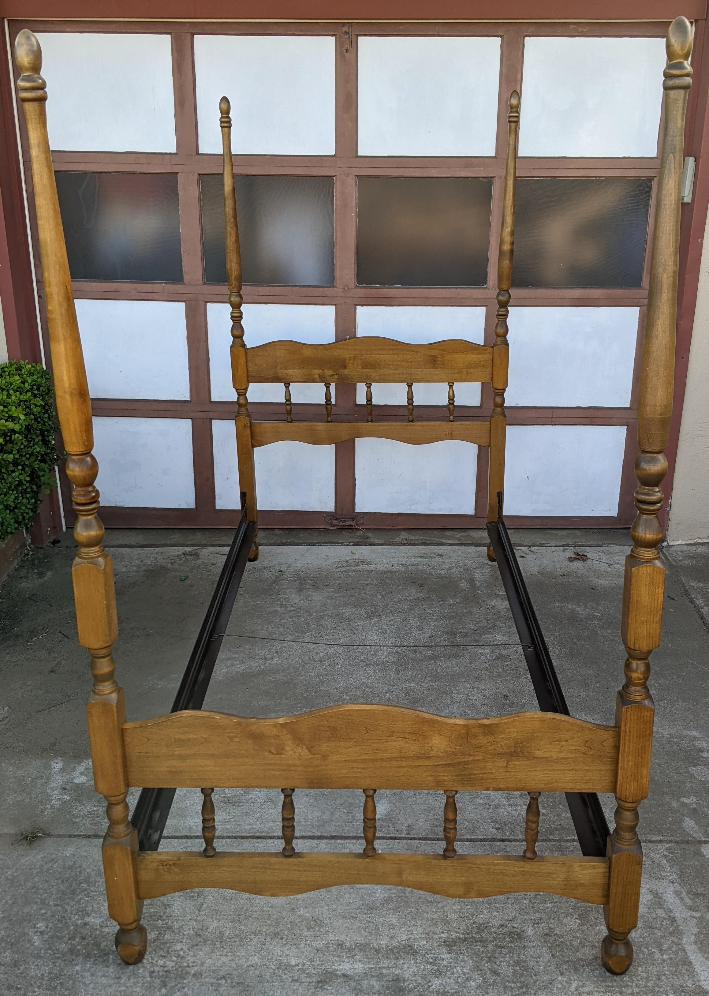 This vintage colonial style four poster bedframe is just the thing for your small person's room. They'll feel cozy and safely ensconced in this lovely four poster bed, made of (presumably) maple. Easy to fit into a cottagecore or granny core