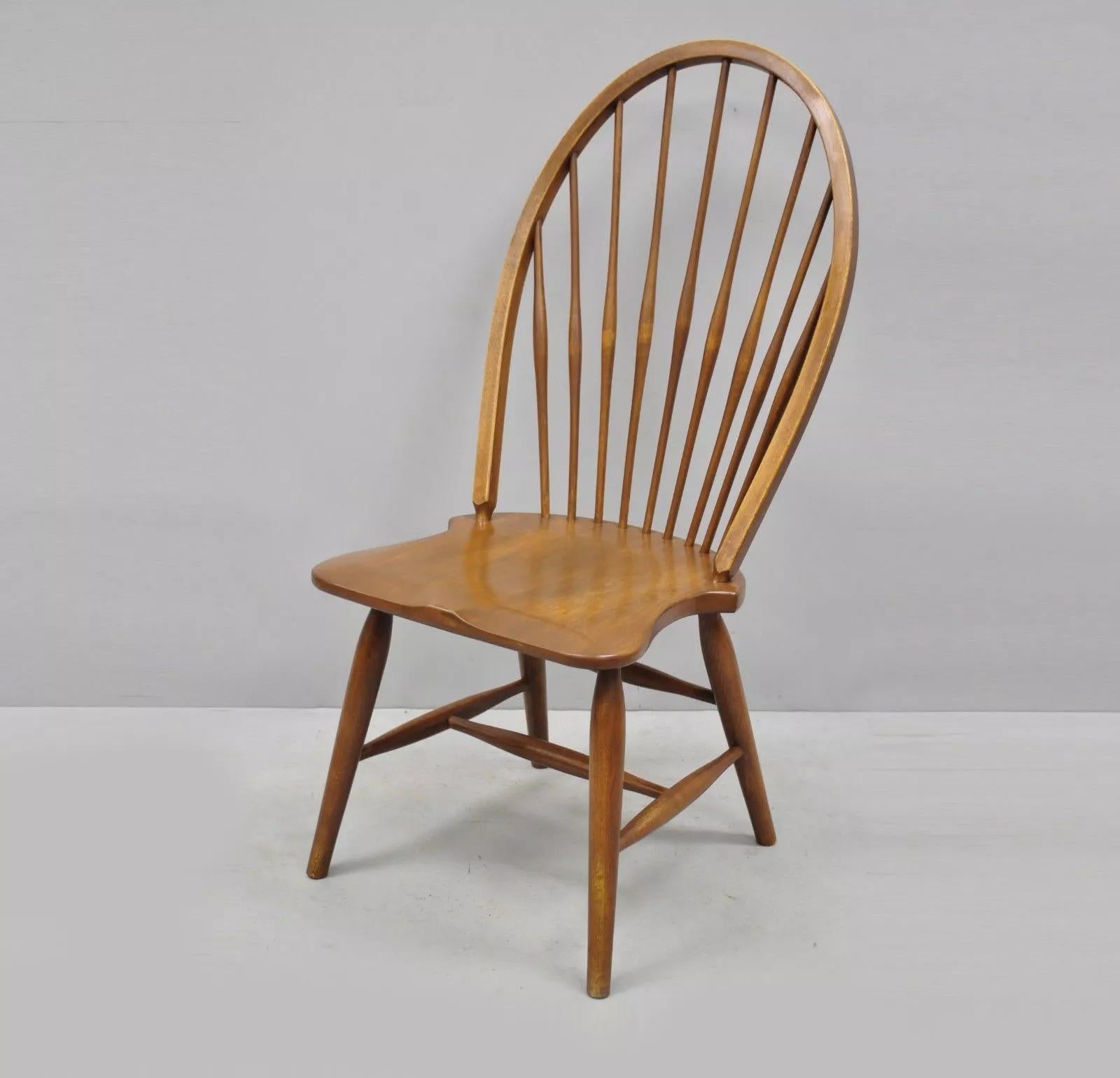 Vintage Maple Wood Fan Back Colonial Windsor Dining Side Chair Made in Slovenia. Details: Solid wood construction, beautiful wood grain, original stamp, tapered legs, quality craftsmanship. Age: Mid 20th Century. Measurements: 41