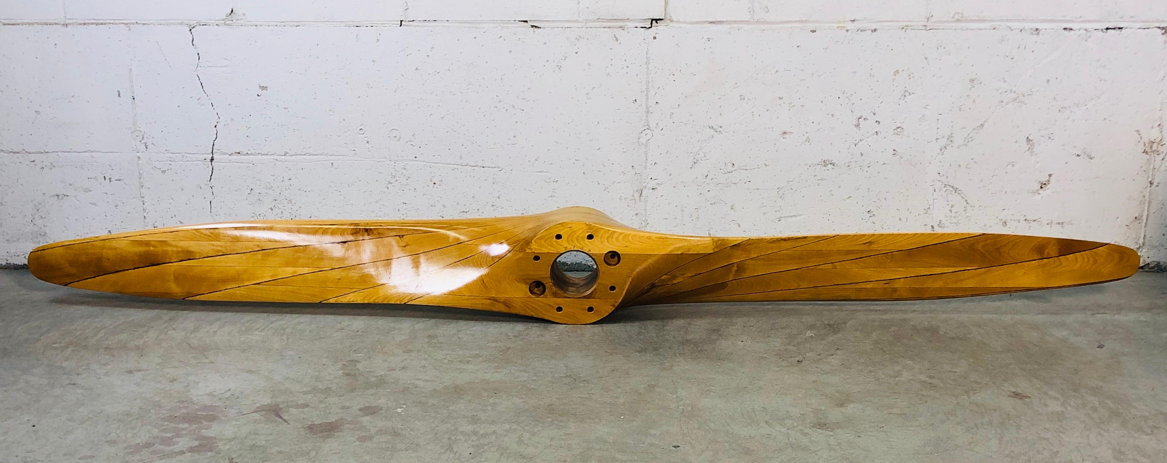 Vintage maple wood large airplane propeller. Solid and heavy wood. In excellent condition.
