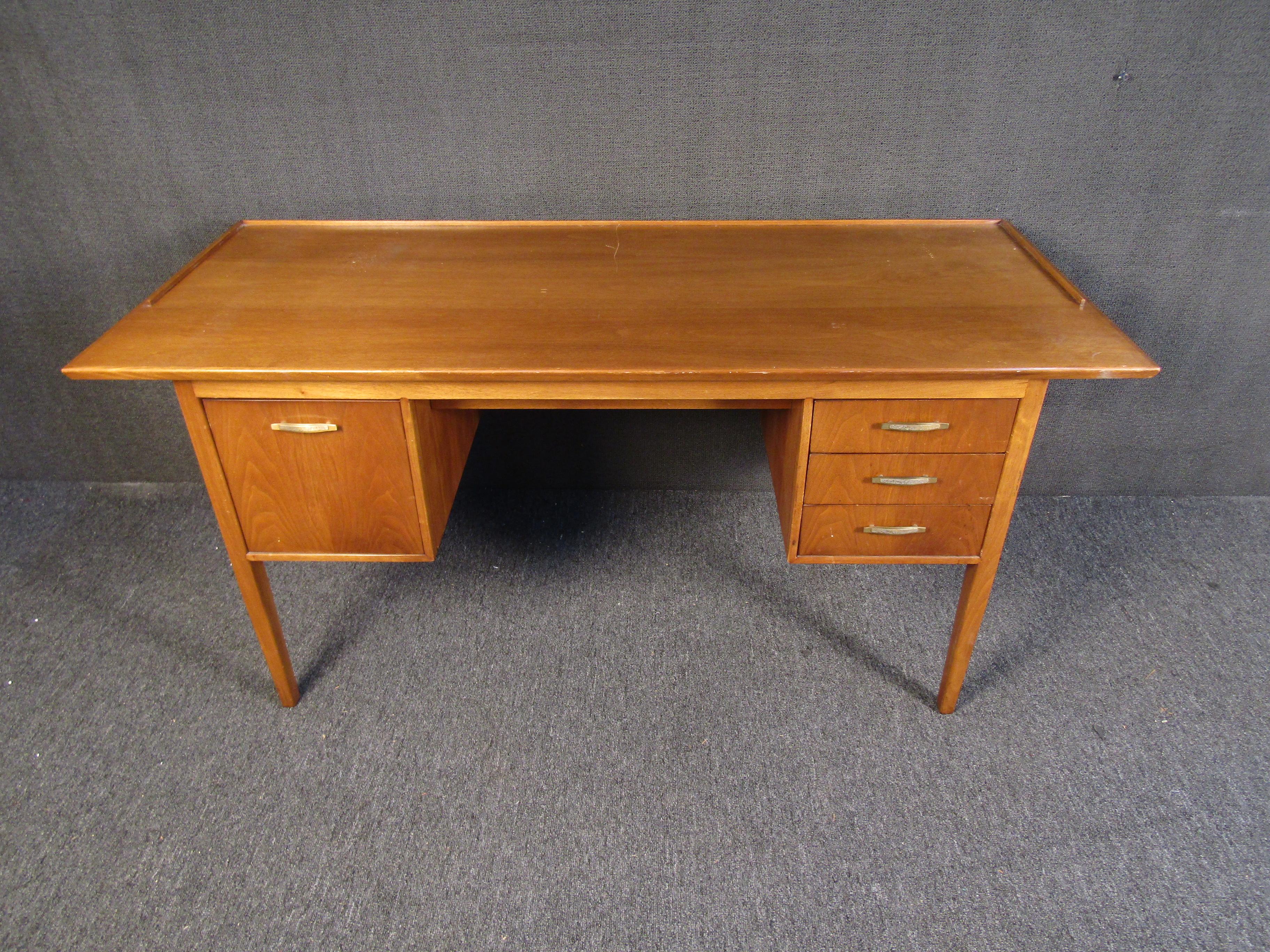 Mid-Century Modern writing desk combining sturdy quality with great design. Manufactured by Drexel Furniture of North Carolina for their 