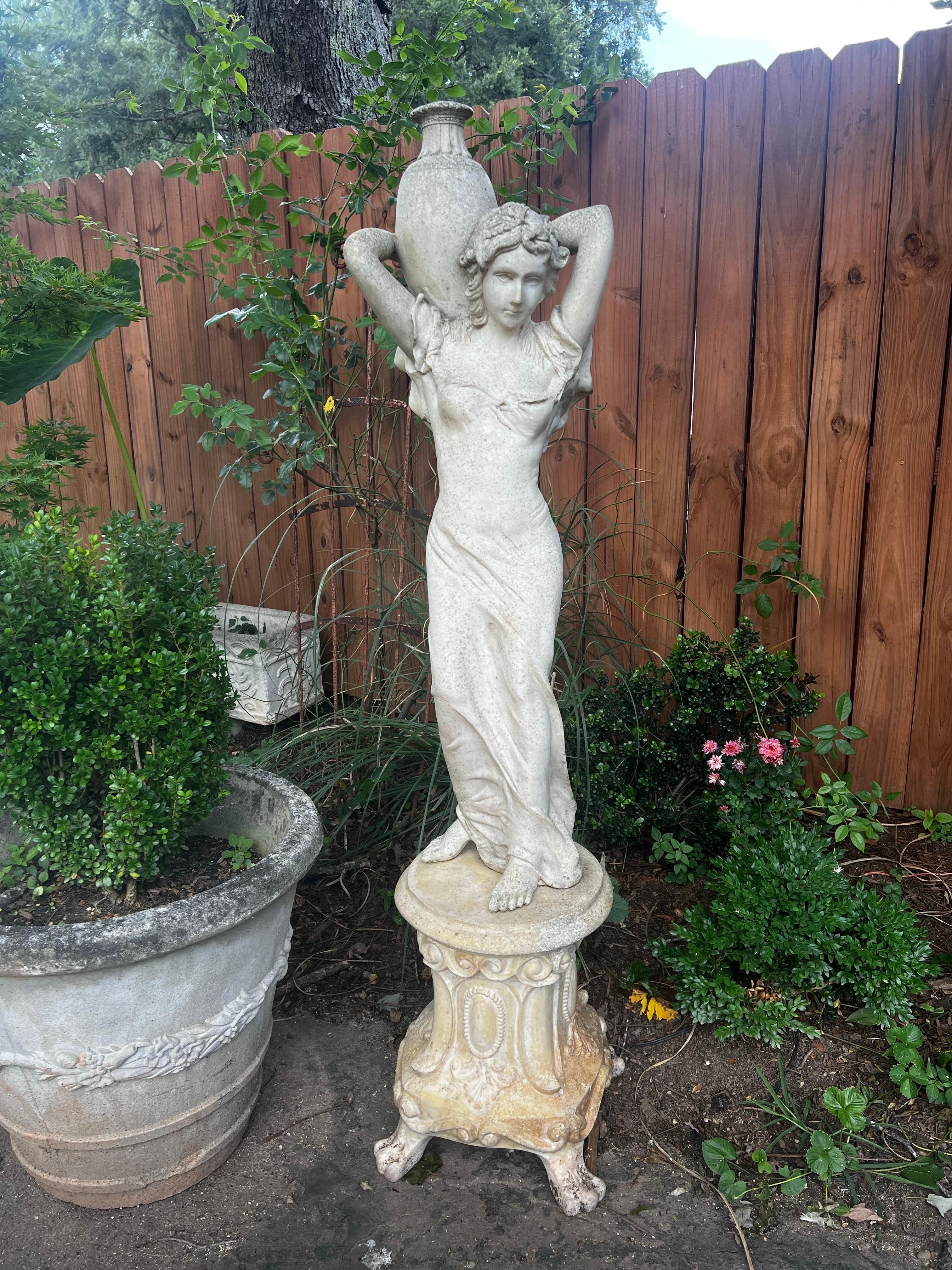 Indoor or Outdoor Statue.
Cast of Greek Goddess in the style of Venus the Water Bearer.
Mix of crushed alabaster and marble mixed with GFRC.  Giving it a solid stone look with much lighter weight.  

Stands 60 inches tall and is attached to the