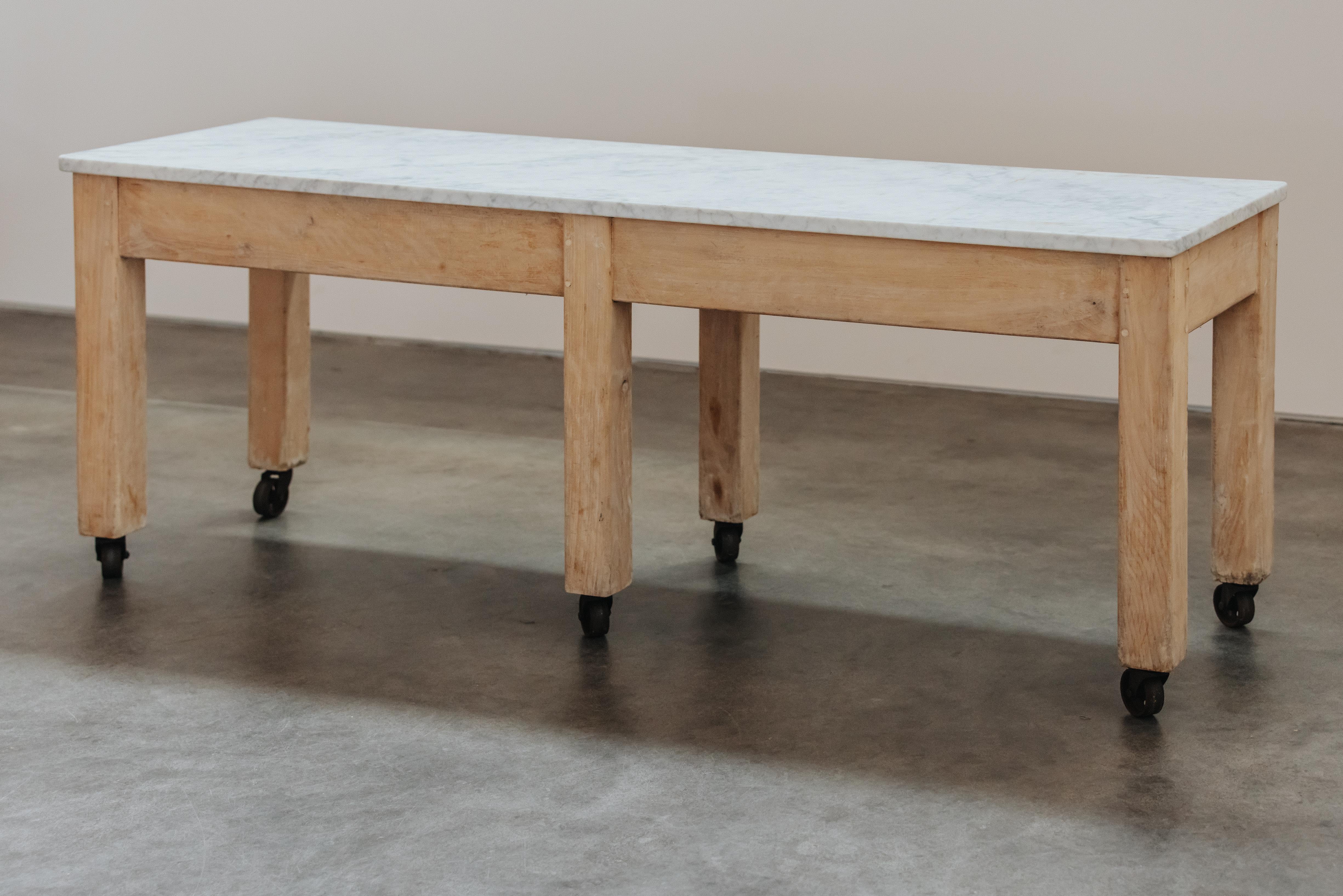 Vintage Marble Bakery Console Table From France, Circa 1940.  Solid Beech construction with a white marble top.  Nice patina and use.