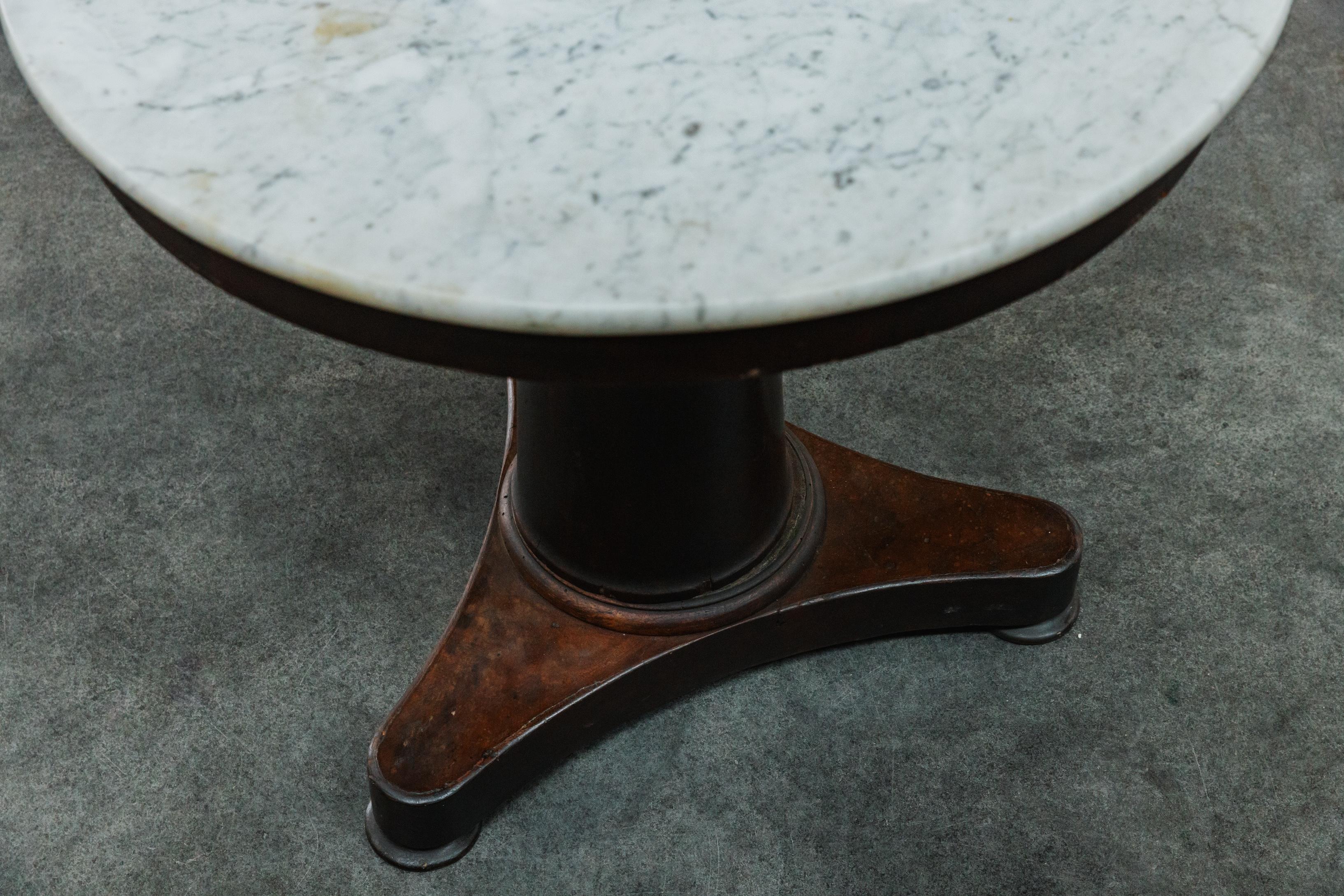Vintage Marble Empire Table From France, Circa 1900.  Mahogany base with original white marble top.  Nice wear and use.
