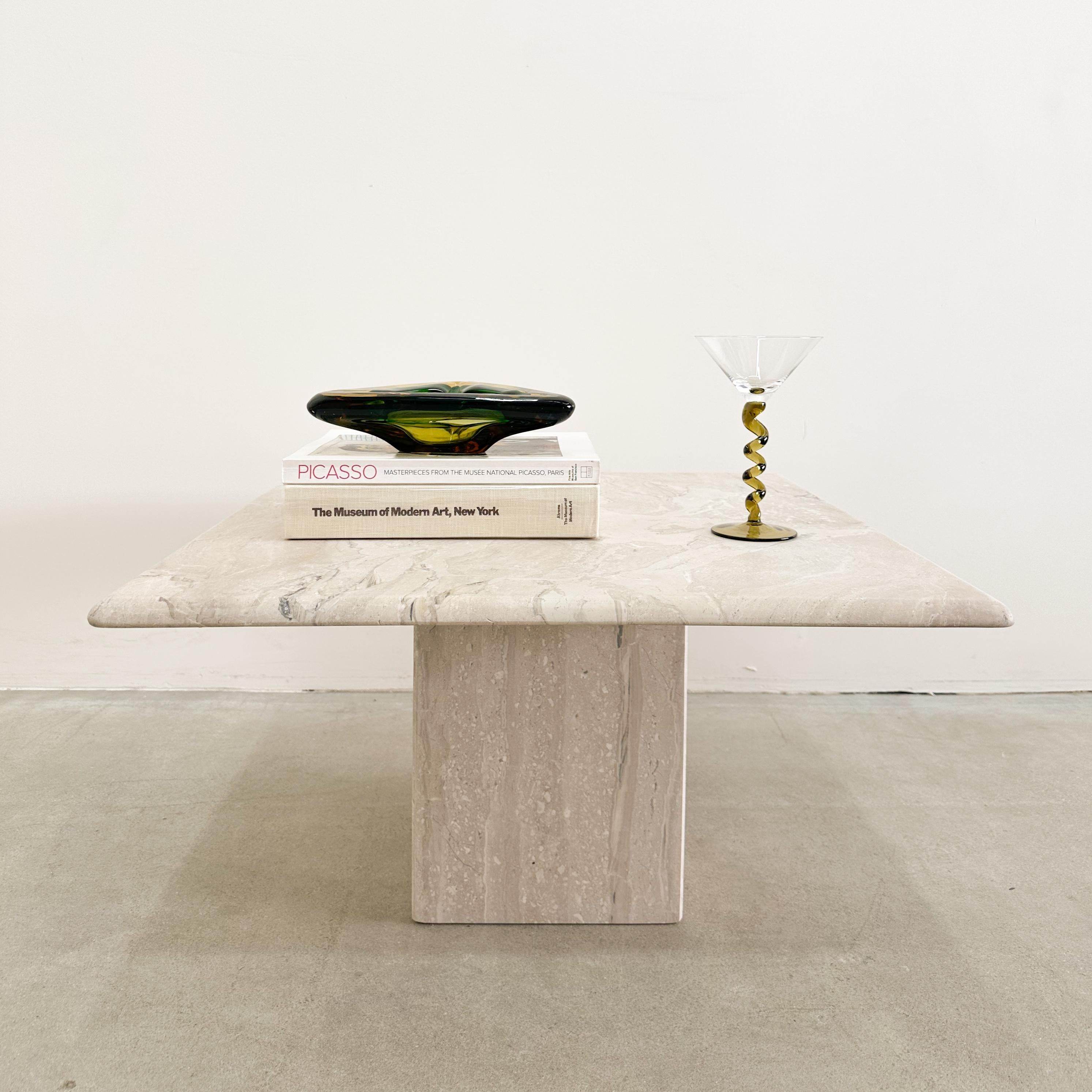 Vintage Cream Marble End Table. 

Made out of solid marble stone. It's in two parts. The tabletop rests on the base. 
Can be a great coffee table for a small area. 

Color: Cream and light beige (hard to capture the color in the photo)
Stone: Marble