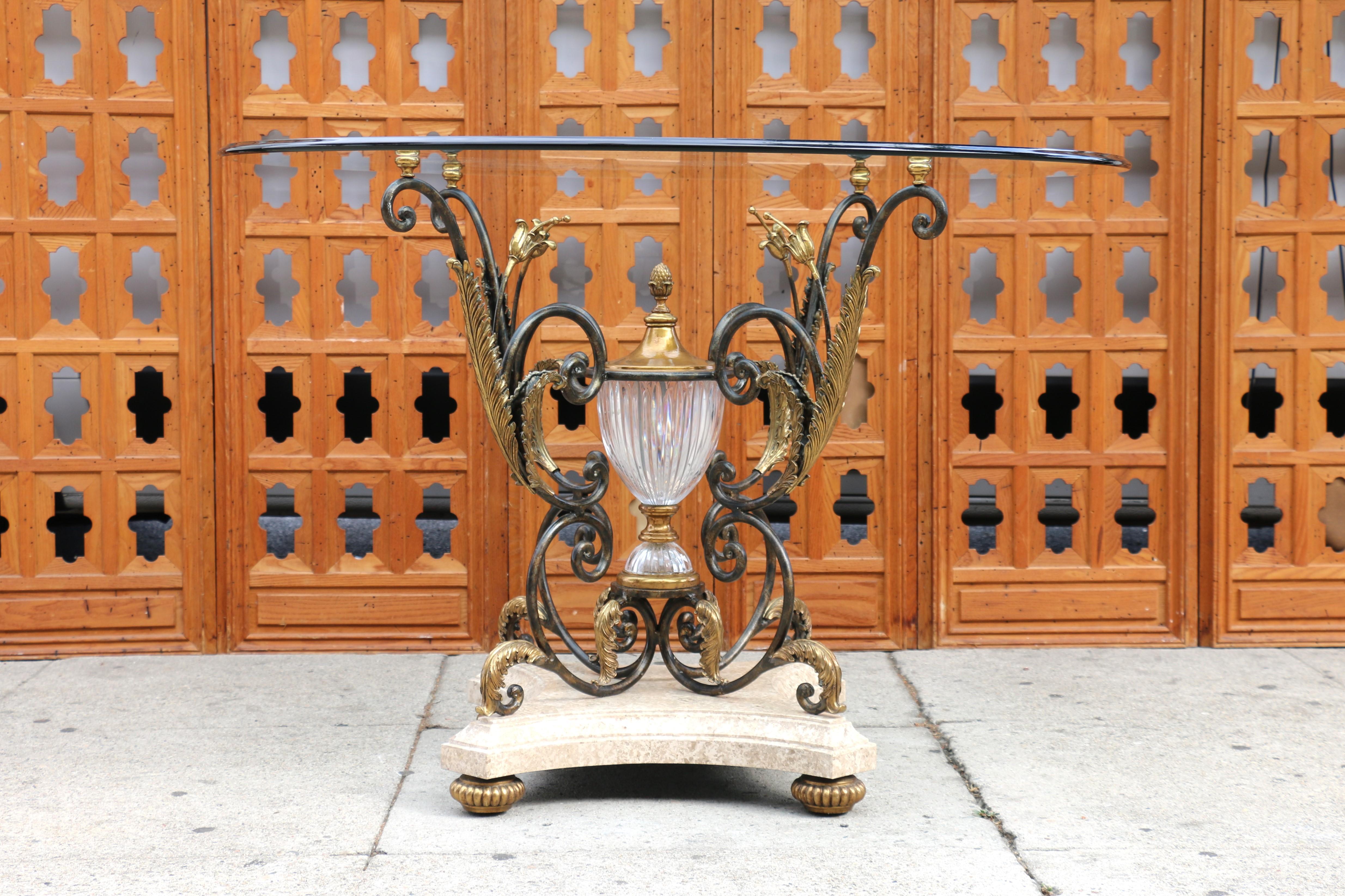 Spectacular good quality center round table designed by La Barge. Original from the 1980’s and made in Philippines, (It has the label in the bottom). This gorgeous table is made of metal and brass details with a marble base and a glass top.