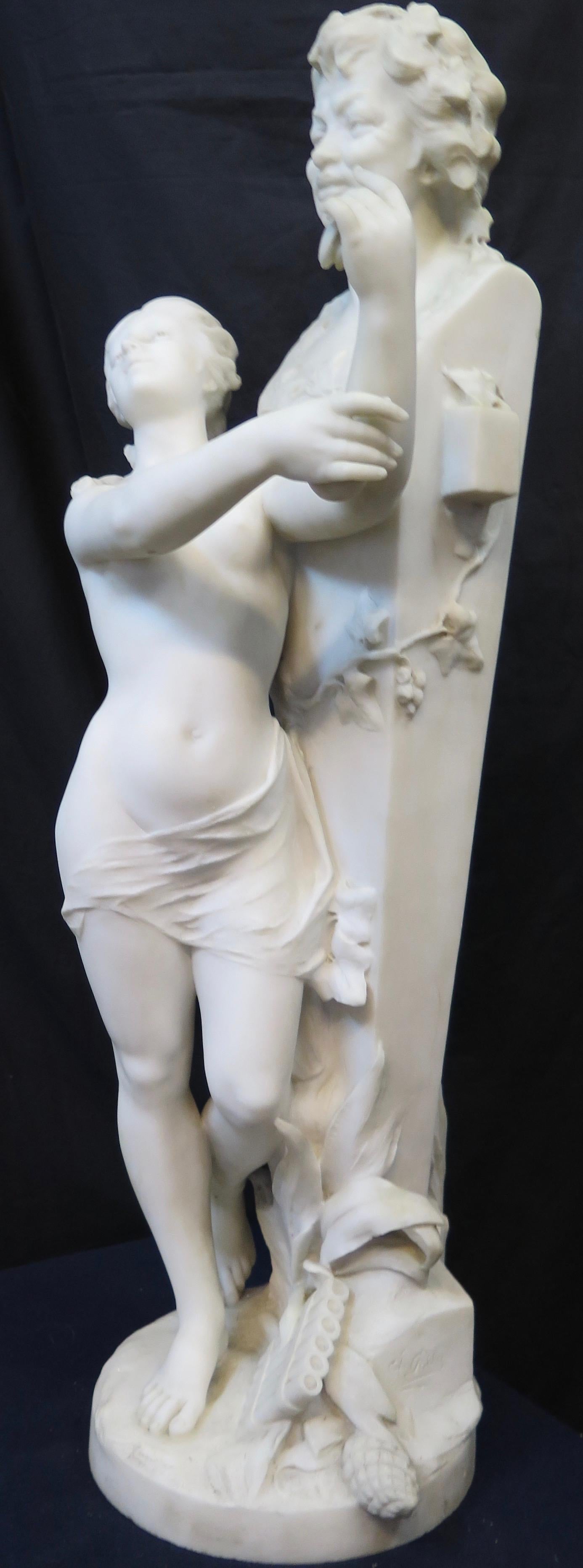 This vintage 19th century Continental statue of Bacchus & an admiring nymph is done in marble & is artist signed. It depicts a nude nymph reveling in her
position immediately in front of the Bacchus monument. The base of the work is signed F. Palla.