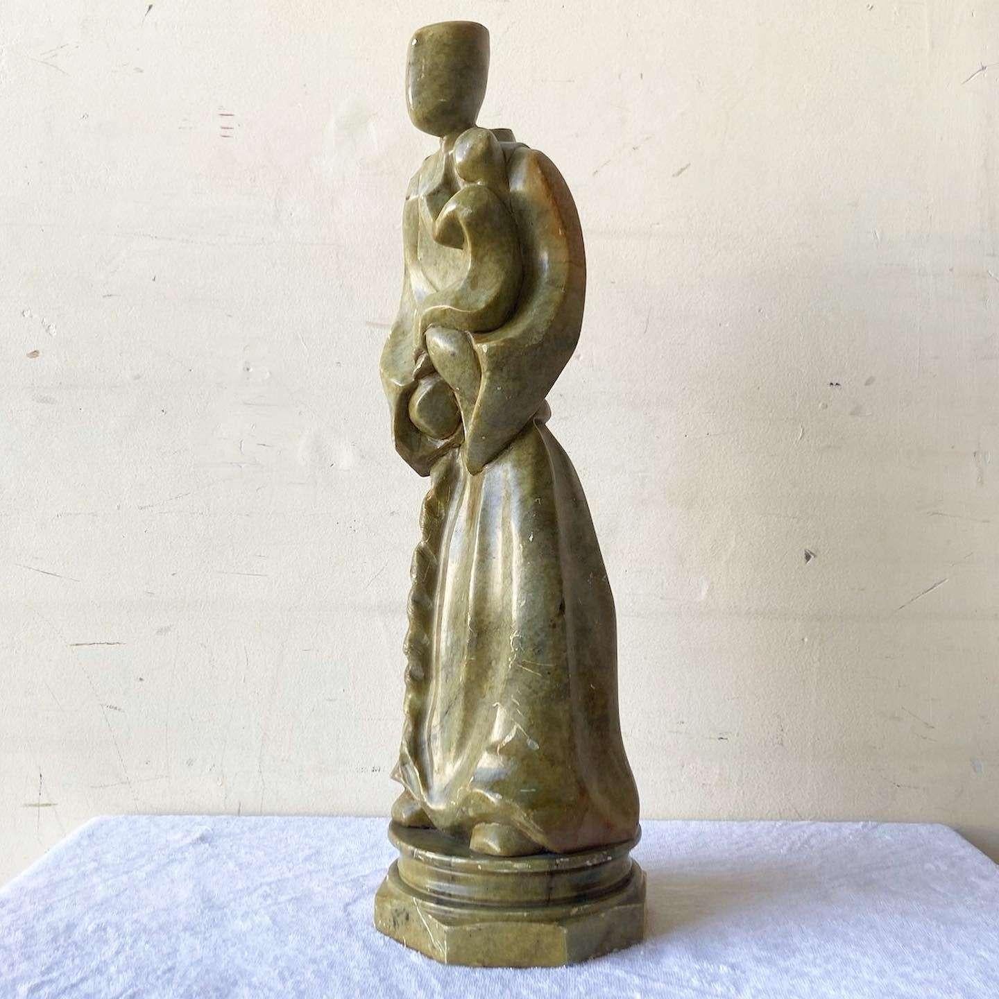 Exceptional vintage handmade marble sculpture of St. Anthony holding a child. Features a fantastic smooth polished finish of a green stone.
