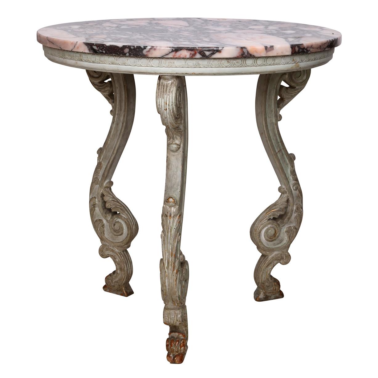 A gorgeous vintage side table with removable marble top with Serge Roche inspired carved detail.