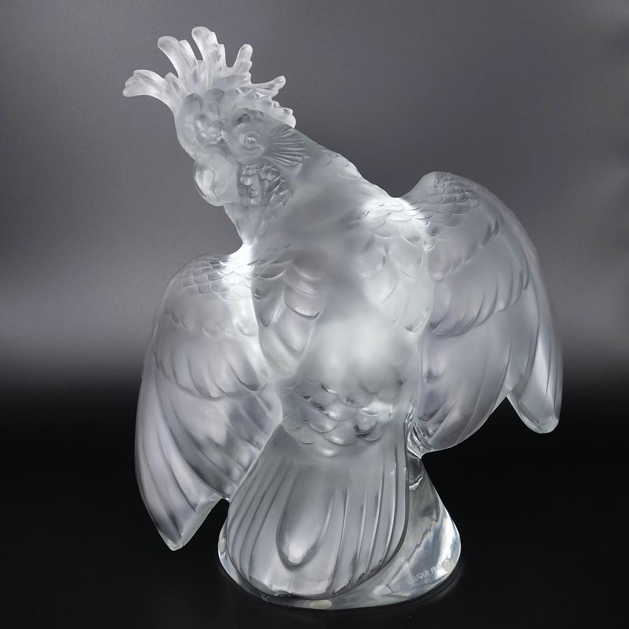 Presenting this large “Cockatiel” Lalique sculpture in etched and polished clear crystal. This vintage example dates from the first release of this piece in 1953 and was designed by Rene Lalique's son Marc. Signed by acid etch on the front bottom