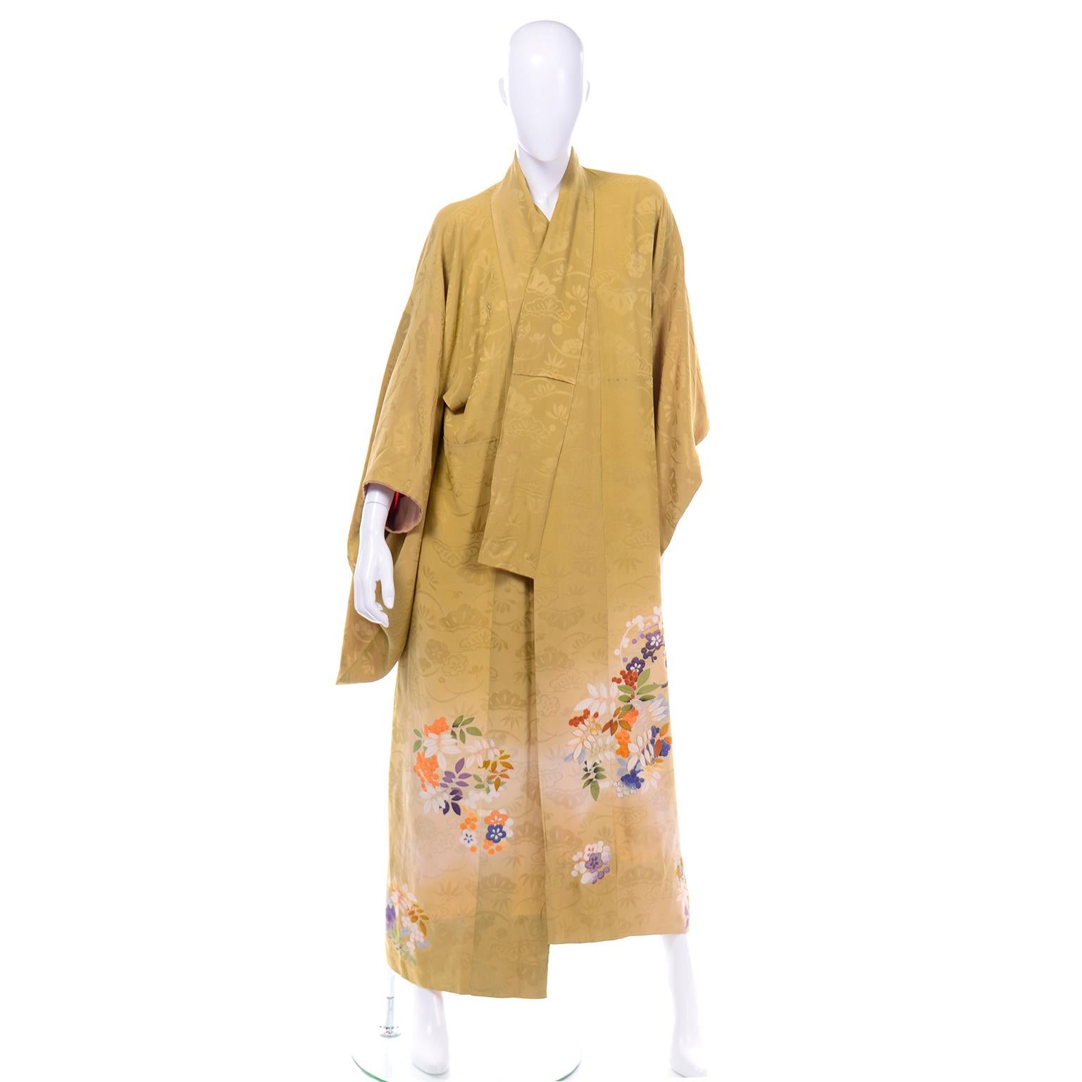 This is a gorgeous marigold yellow jacquard pattern Iro Tomesode style kimono with colorful floral embroidery design near the hem. The beautiful floral colors consist of: purple, gold, white, blue, orange, yellow, green, and light blue. Some of the