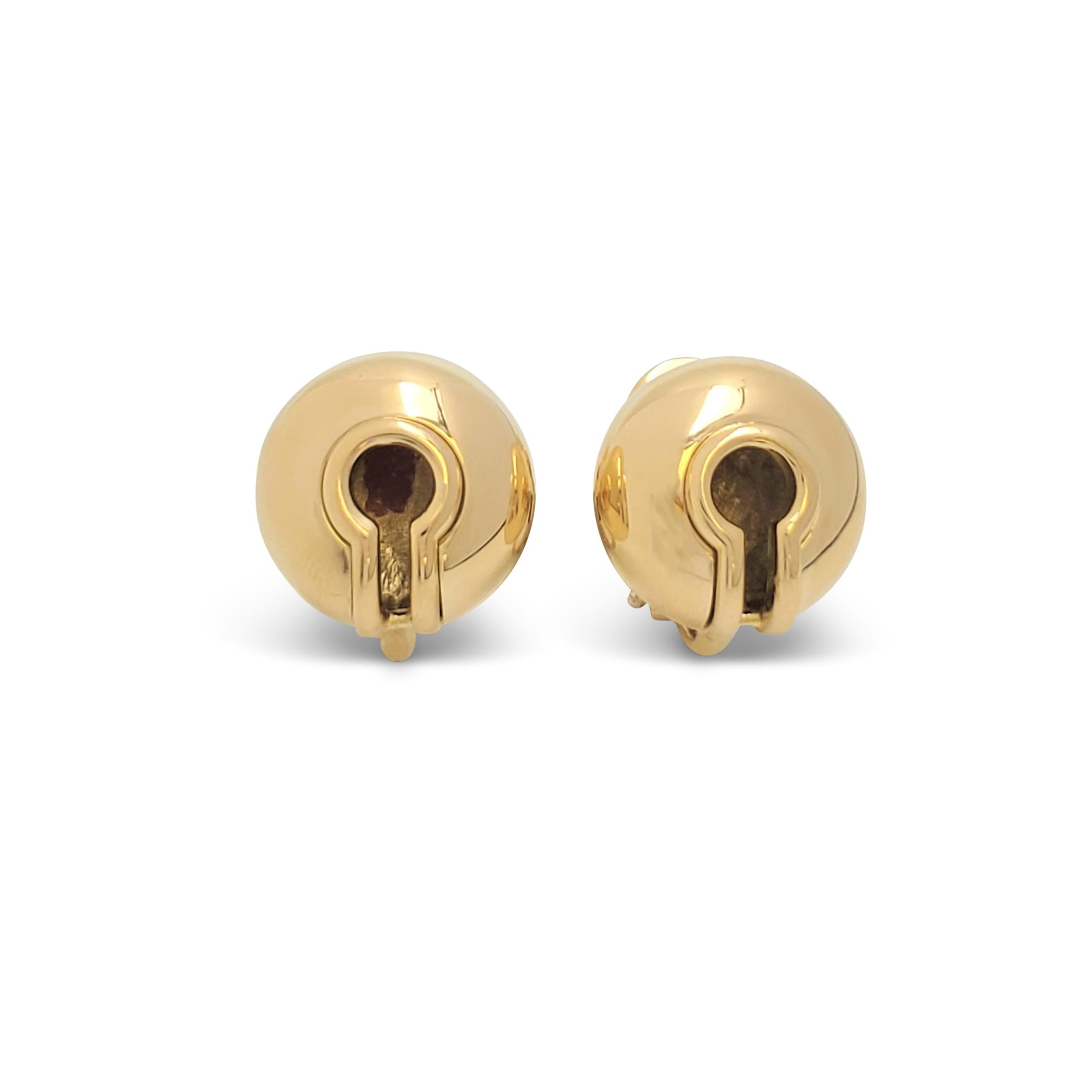 Authentic vintage Marina B. earrings crafted in 18 karat yellow gold feature a playful 