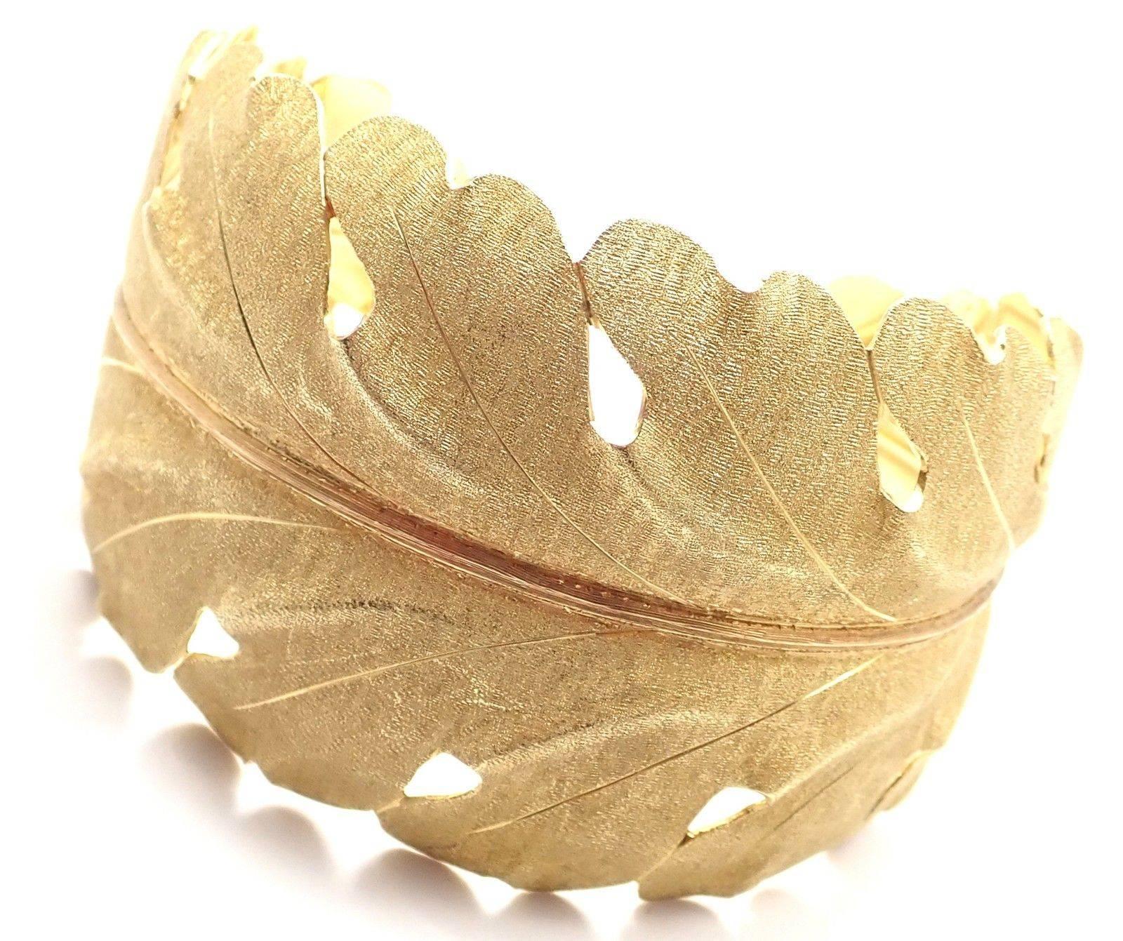 18k Yellow Gold Wide Cuff Leaf Motif Bangle Bracelet by Mario Buccellati.
This bracelet comes with original box.
Details: 
Length: 7