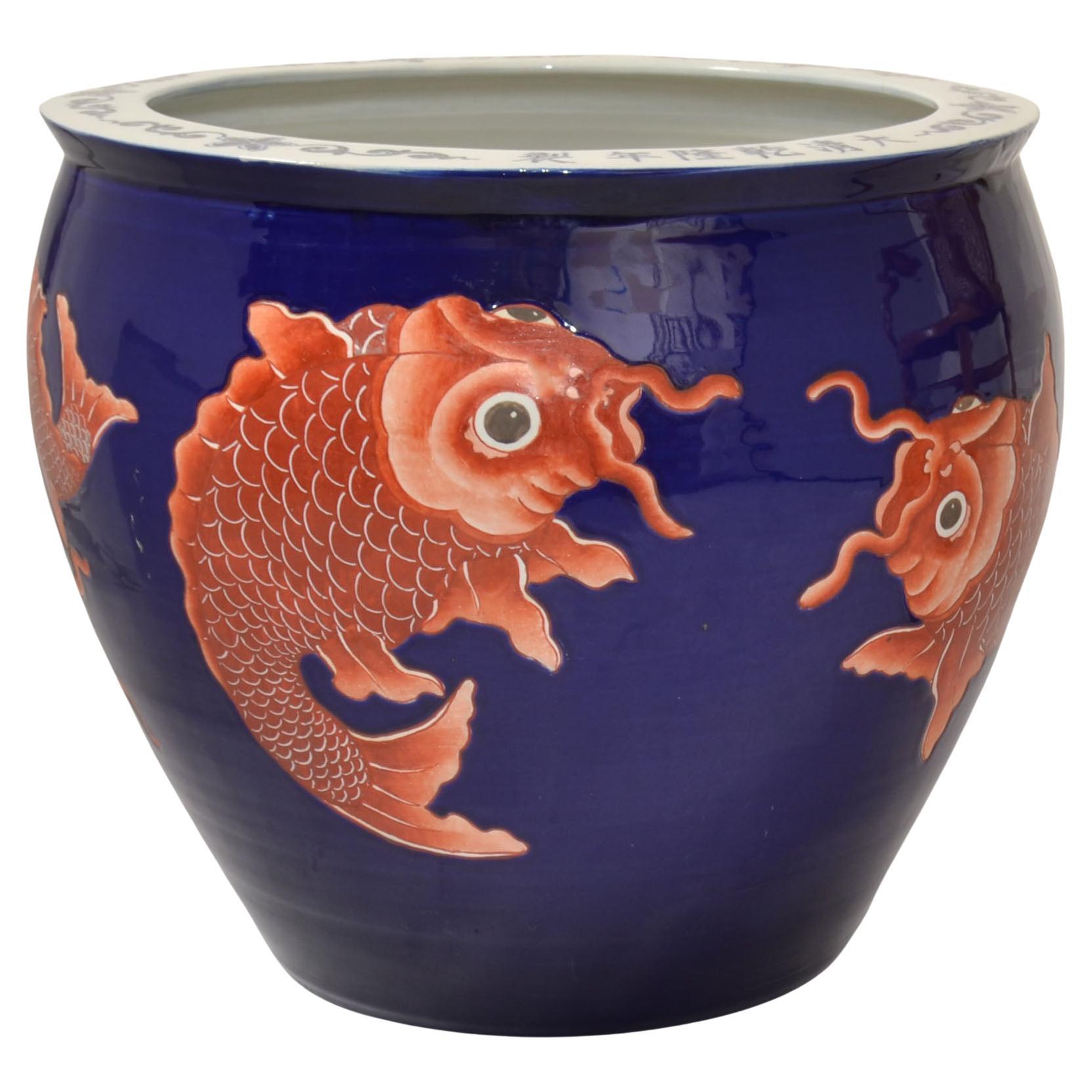 20th Century Vintage Porcelain hand-painted Blue, White and golden Koi Fish Flower Planter, Fishbowl or Jardinieres.
Marked with Chinese Symbols at the Top Rim.
Stunning huge Garden Element, Decoration or Indoor Flower Planter.
In good vintage