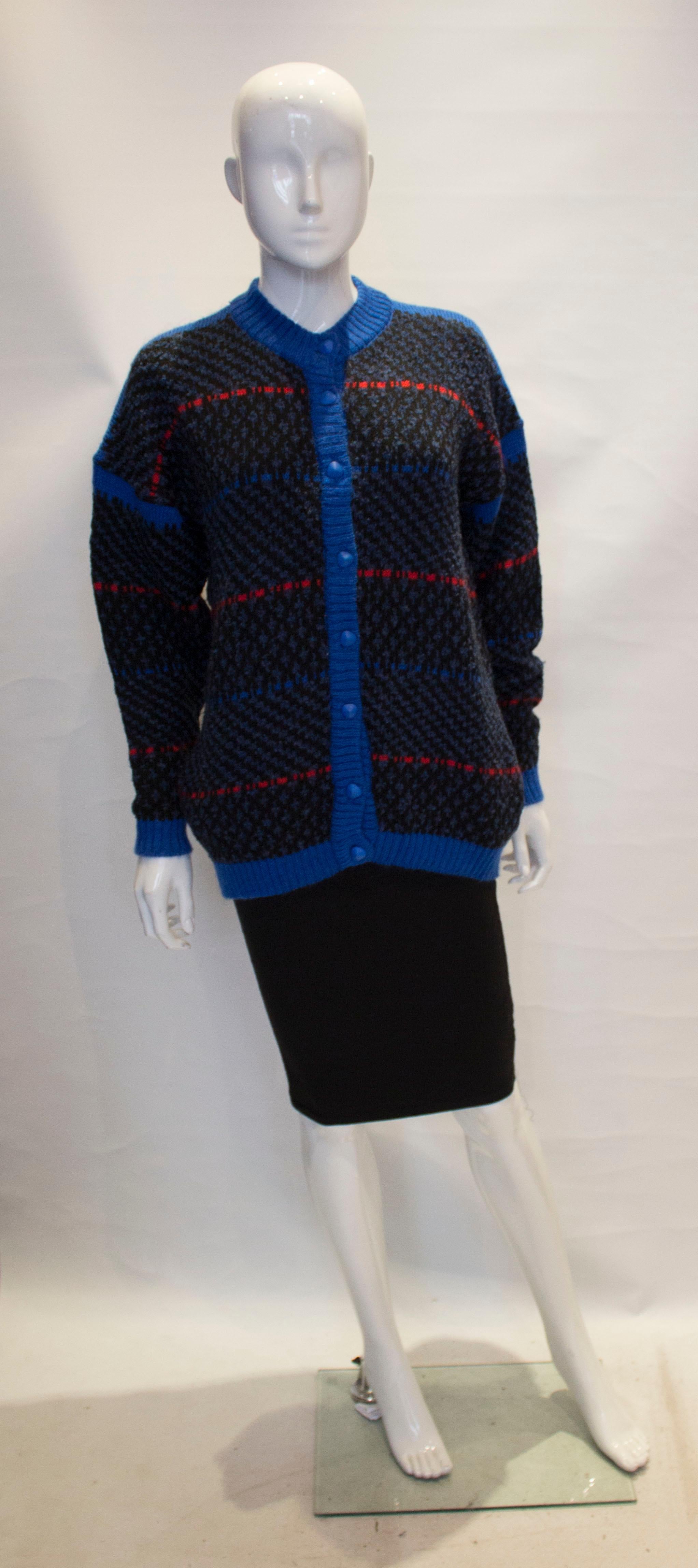 A great vintage  wool cardigan for Fall The cardigan  has a round neckline, front button fastening and two pockets.