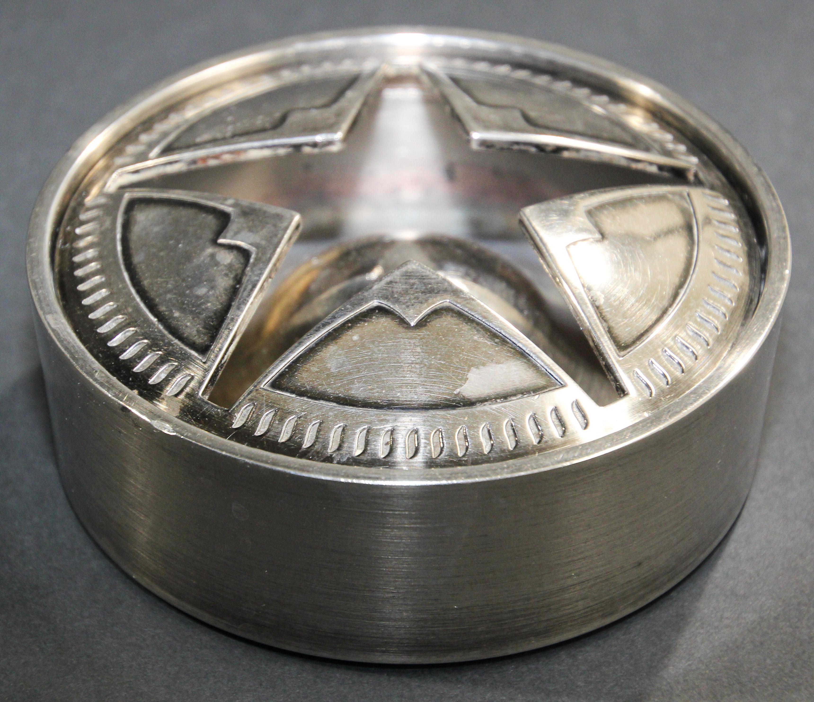 Vintage limited edition Marlboro Star round brushed metal stainless steel ashtray.
Vintage Marlboro ashtray - Texas Star Marlboro, windproof ashtray with lid, star cut out on top lid.
Collectible vintage Marlboro Lone Star Texas ashtray, it has a